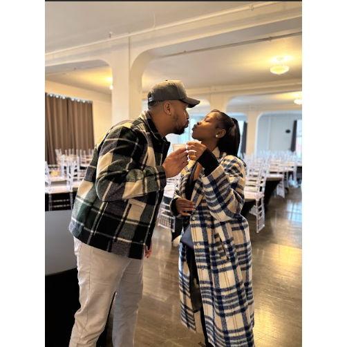 Kam and Angel toasting the venue where the wedding reception will be held in 2026.