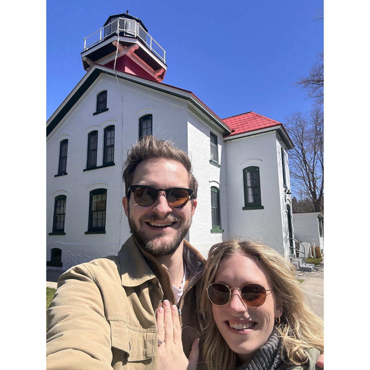 Sam proposed at the top of the Grand Traverse Lighthouse on our second trip to TC
