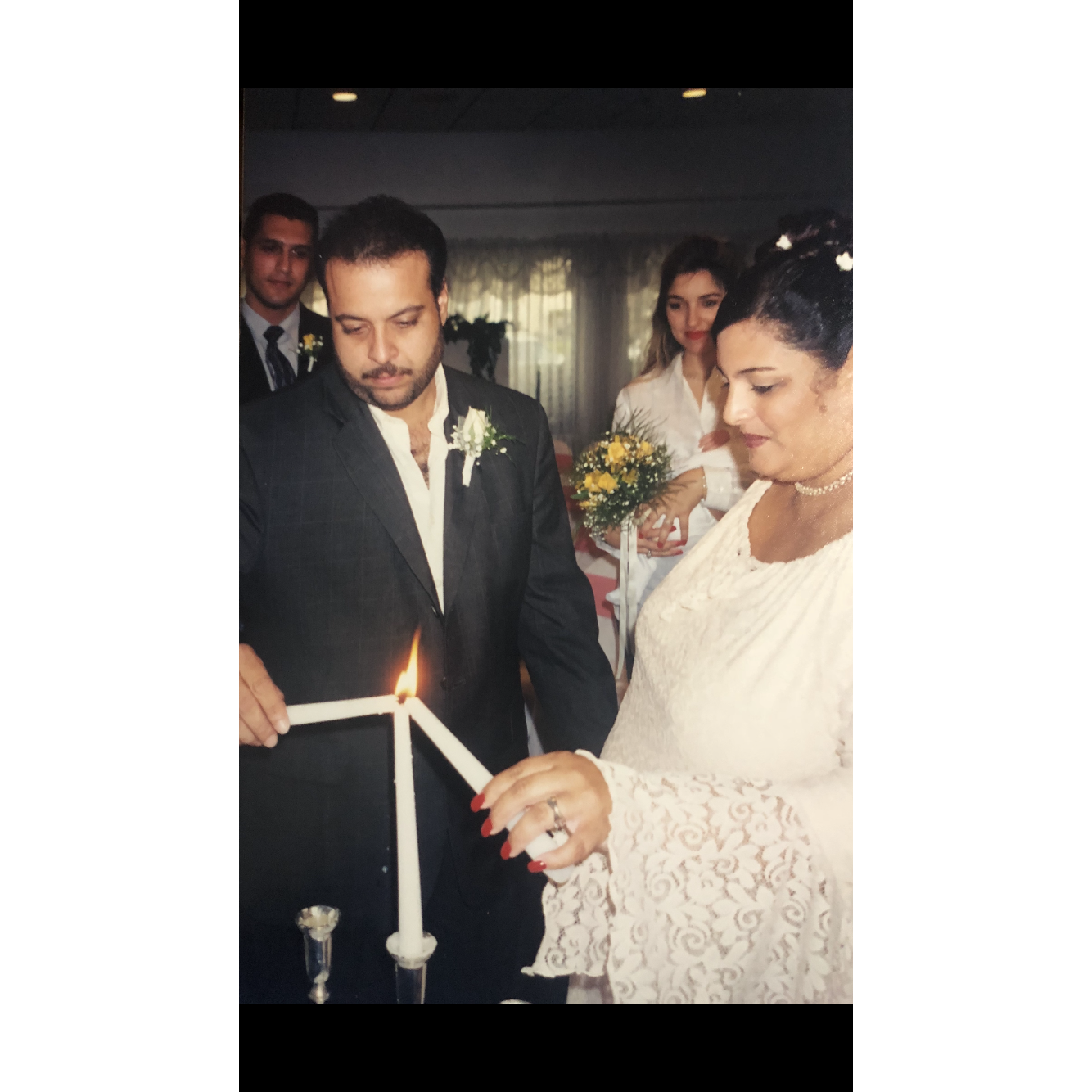 We didn't do the candle ceremony at our wedding.  It was nice to be able to do it at the renewal.
