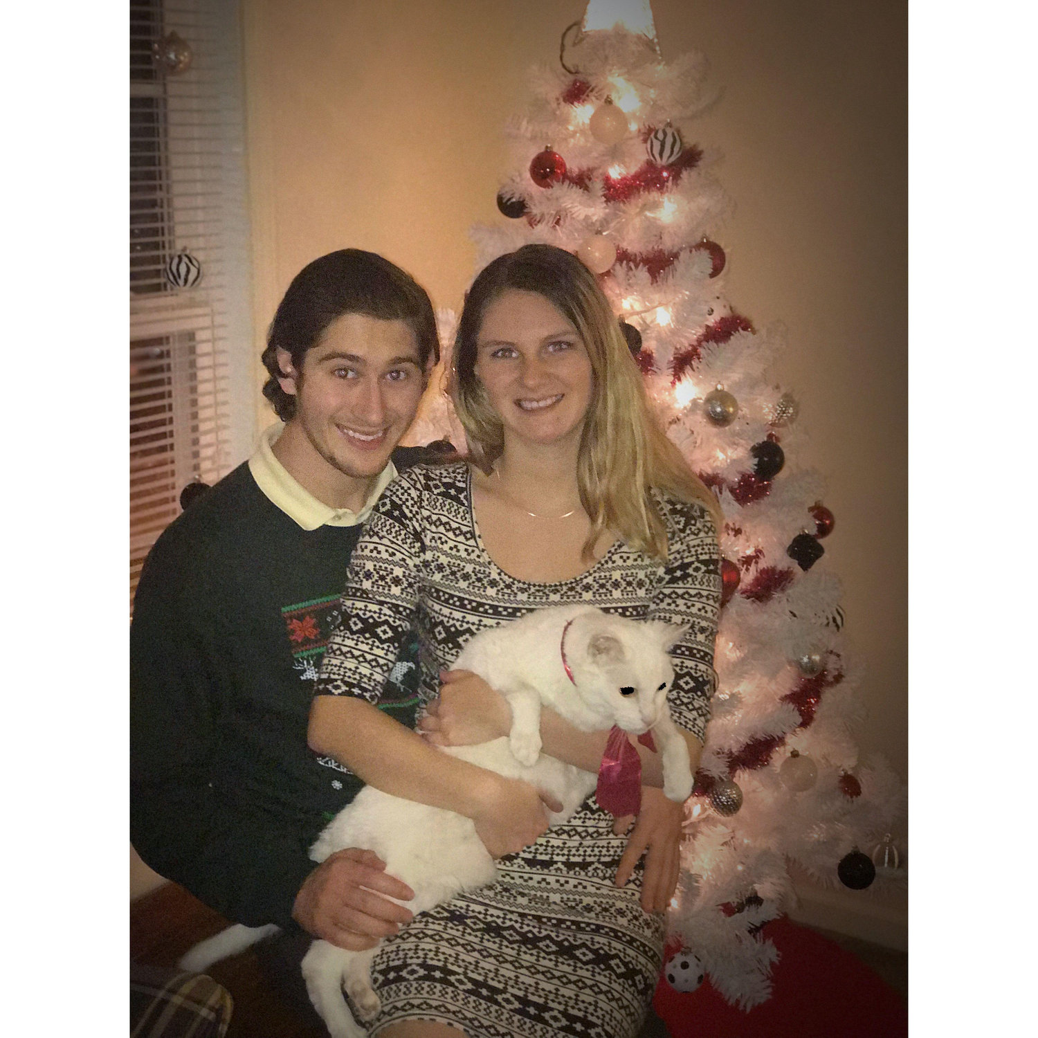 Taking a Christmas card picture with Cameron's beloved cat, Henry 2017