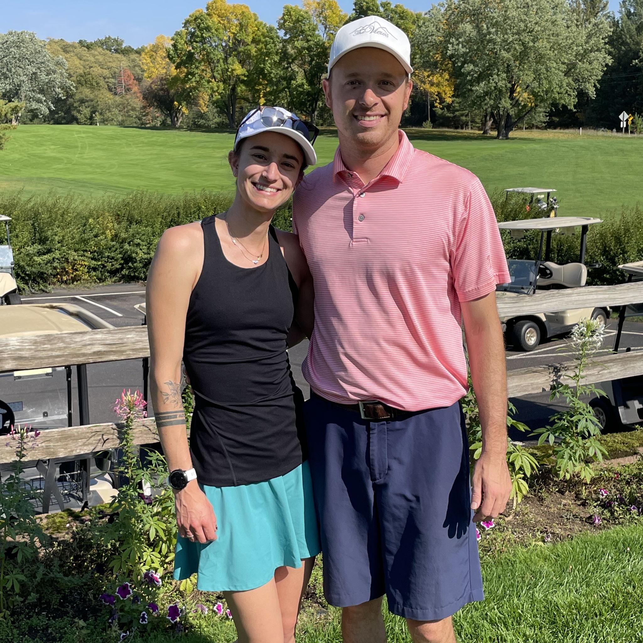 Nicole's first time golfing.