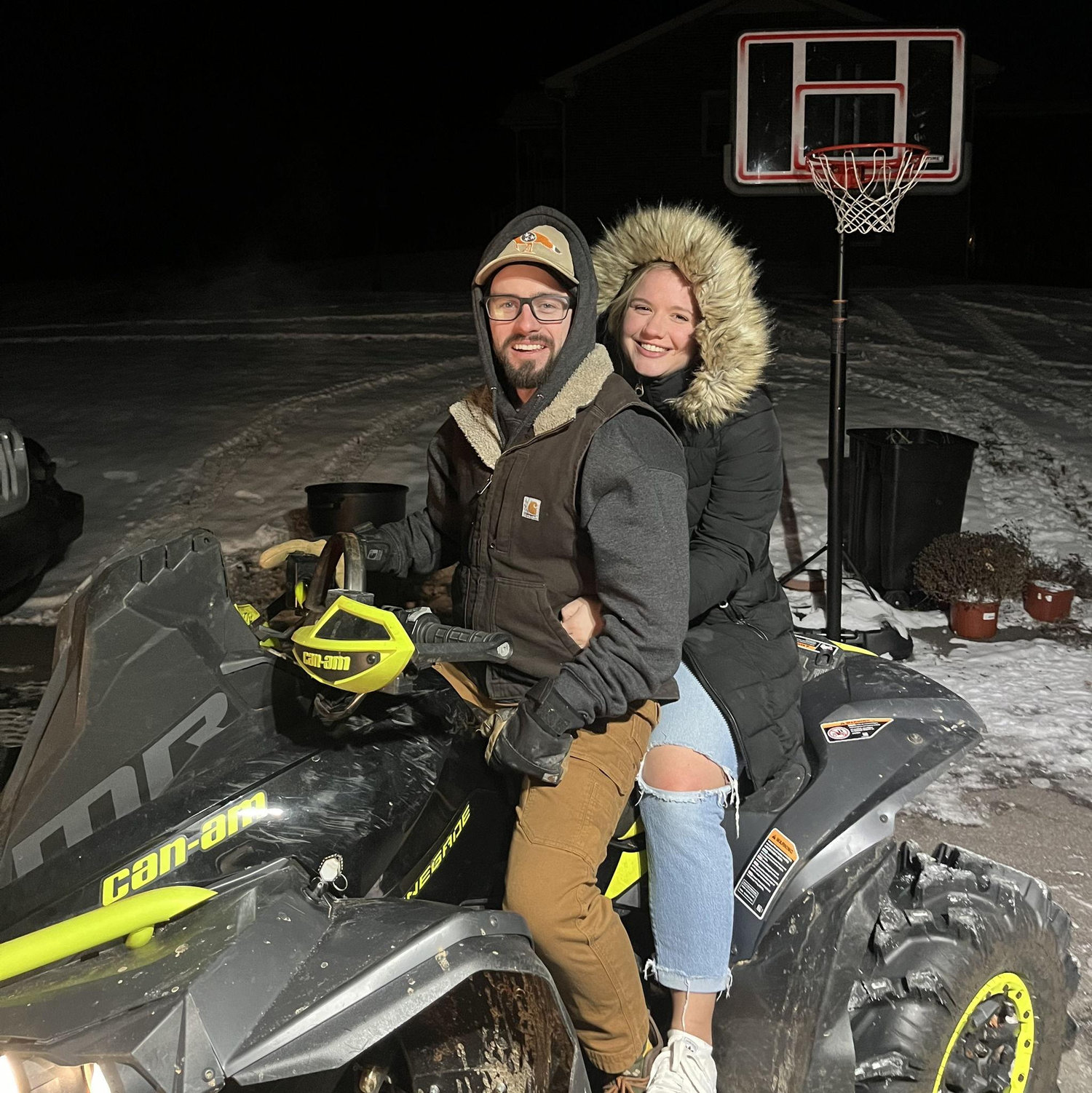One of our first photos together on a freezing cold night and Rachel's first of many ATV rides