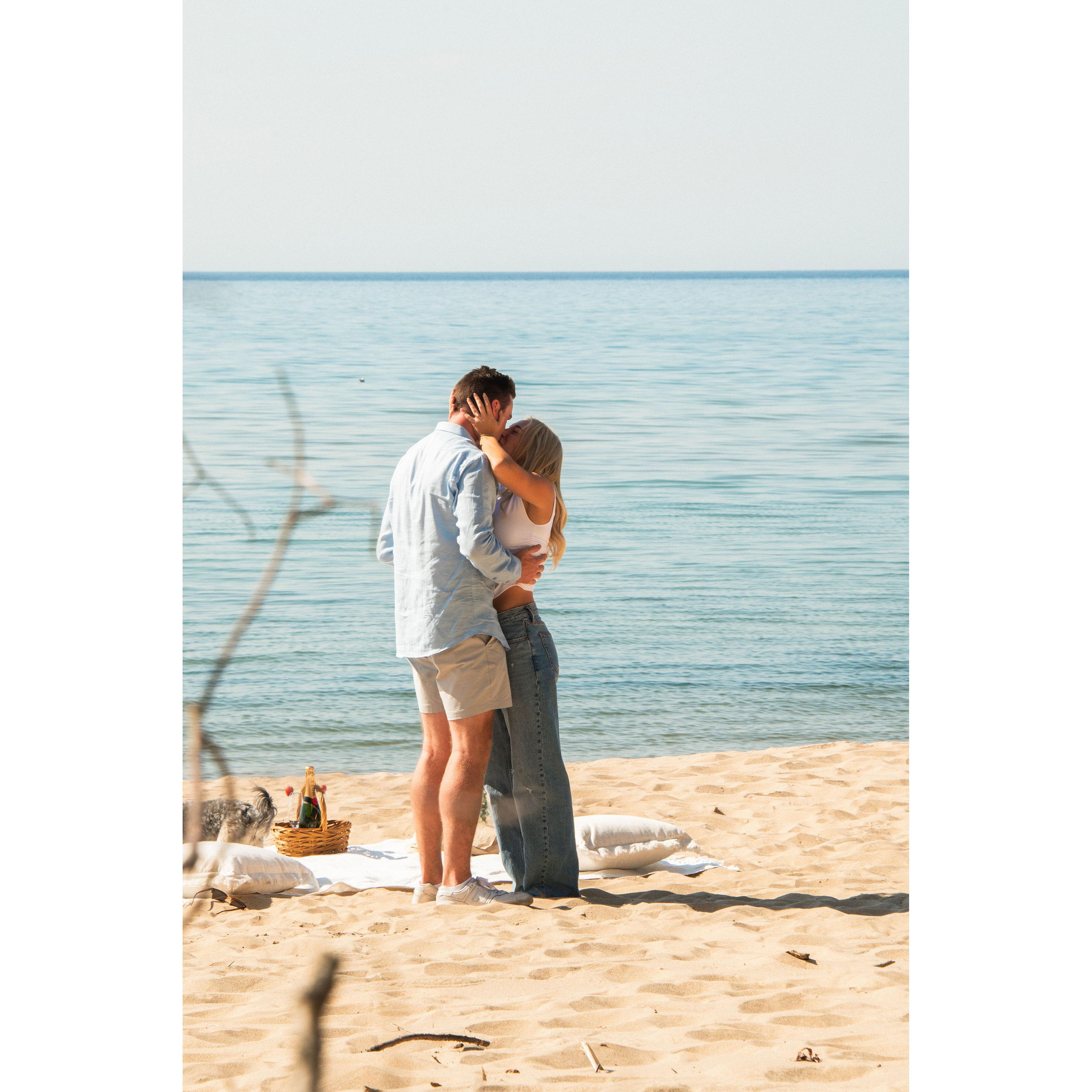 Taylor said yes on a Lake Michigan beach

Berkley got a head start on the charcuterie while Taylor and Paul celebrated