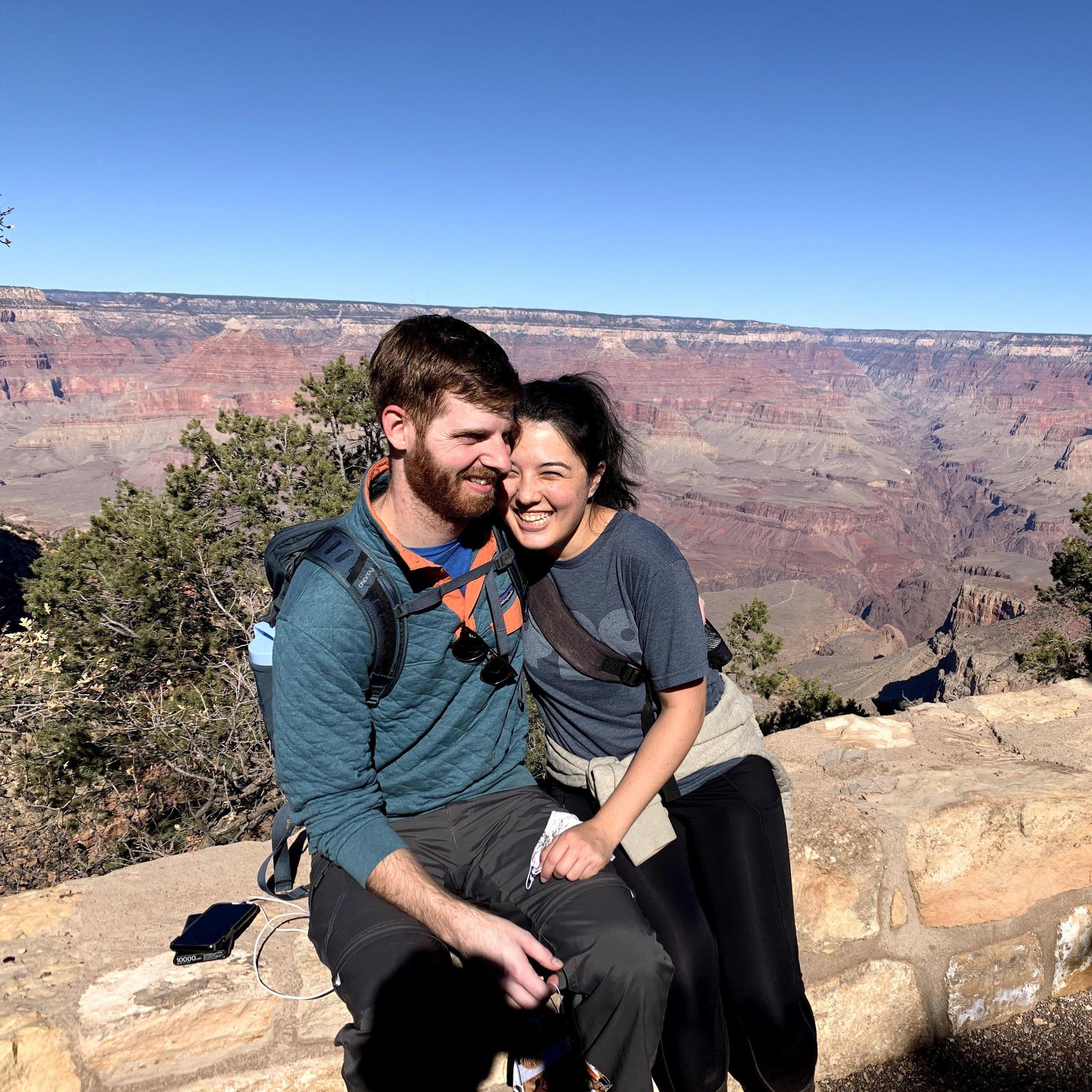 Grand Canyon, AZ | We look happy, but we're really sitting because the hike back up out of the canyon was brutal.