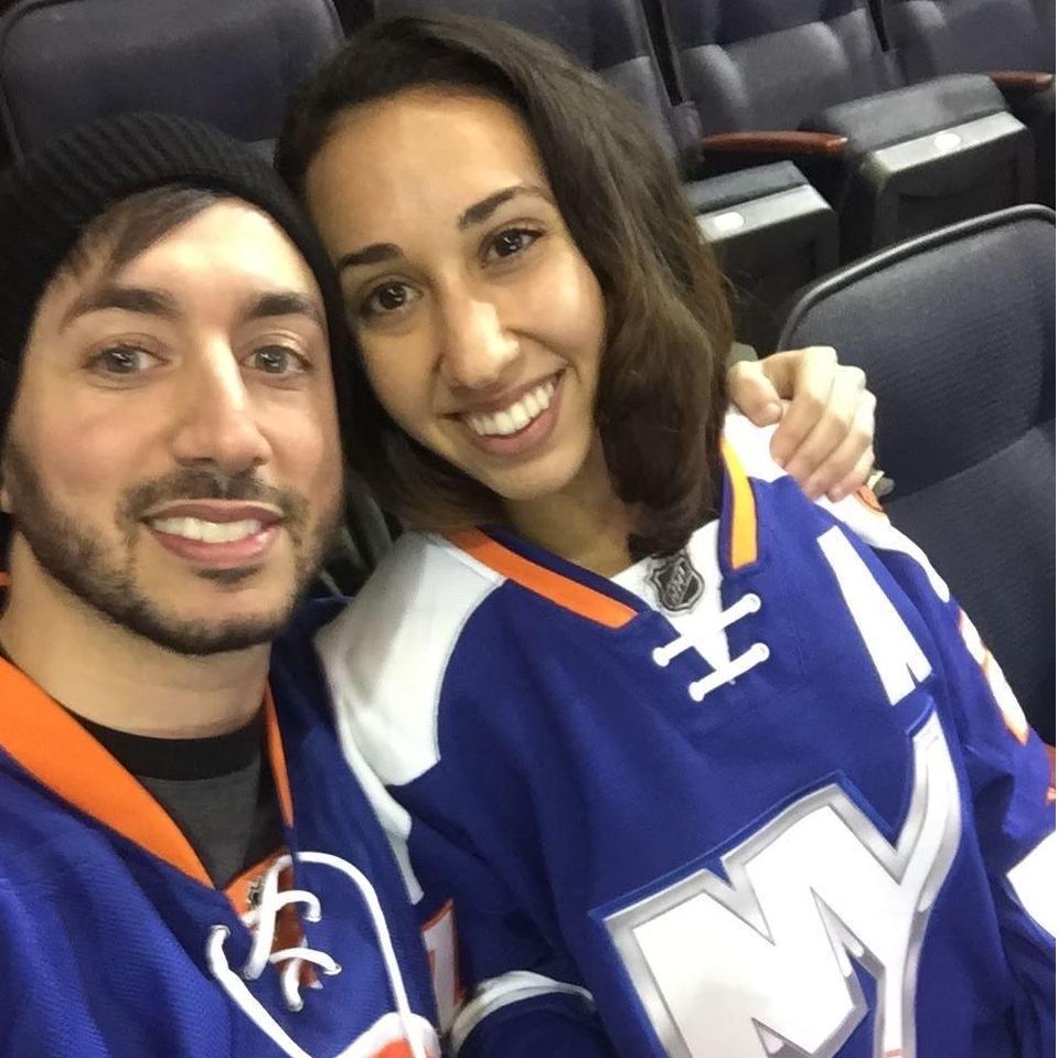 Our first photo together (and Jasmin's first hockey game! Go Islanders!)