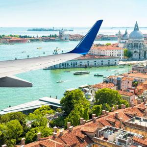 Two Roundtrip Tickets to Italy