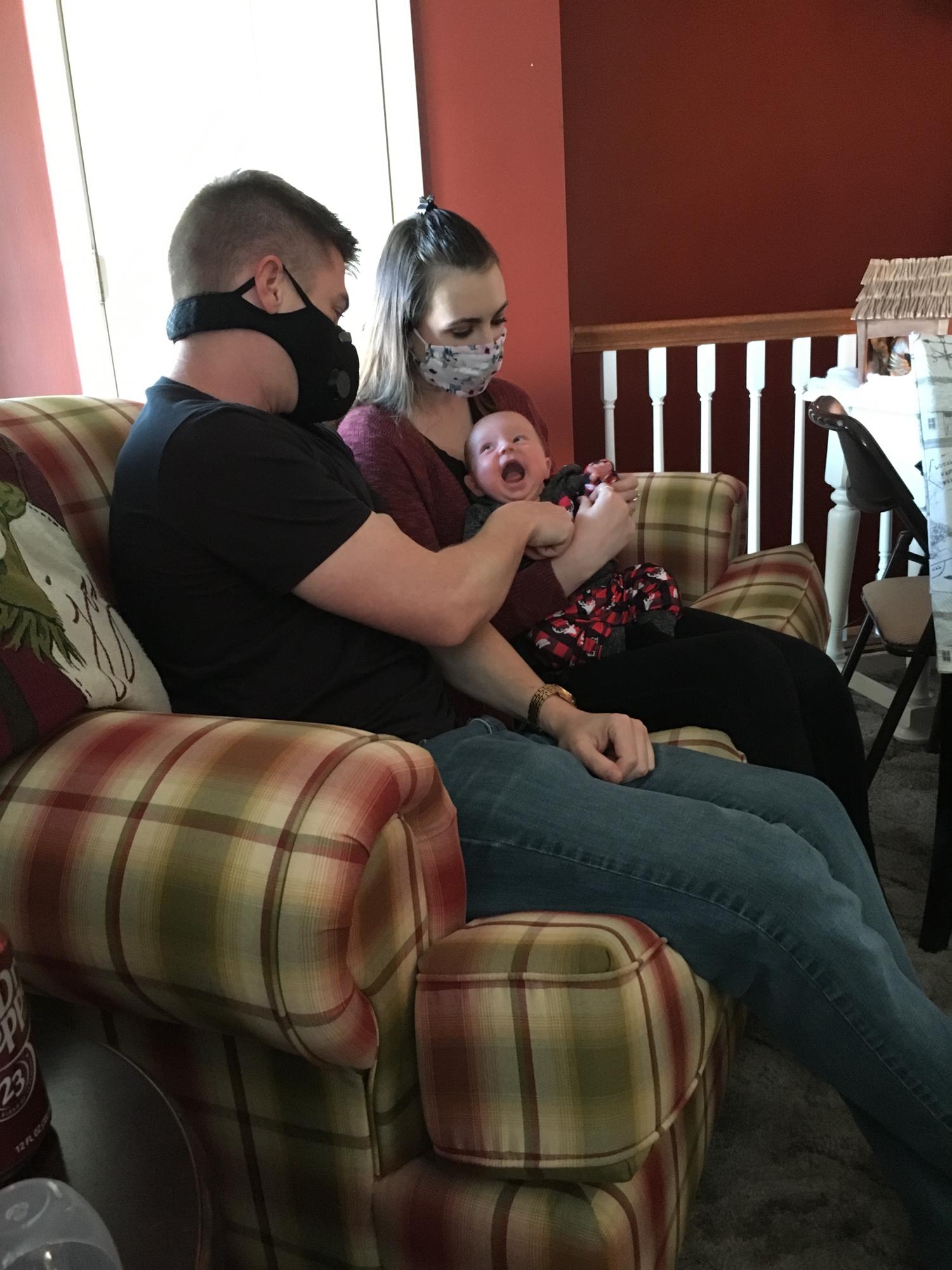 Holding Ryker, one of Madison's Sisters twin babies during Thanksgiving 2020