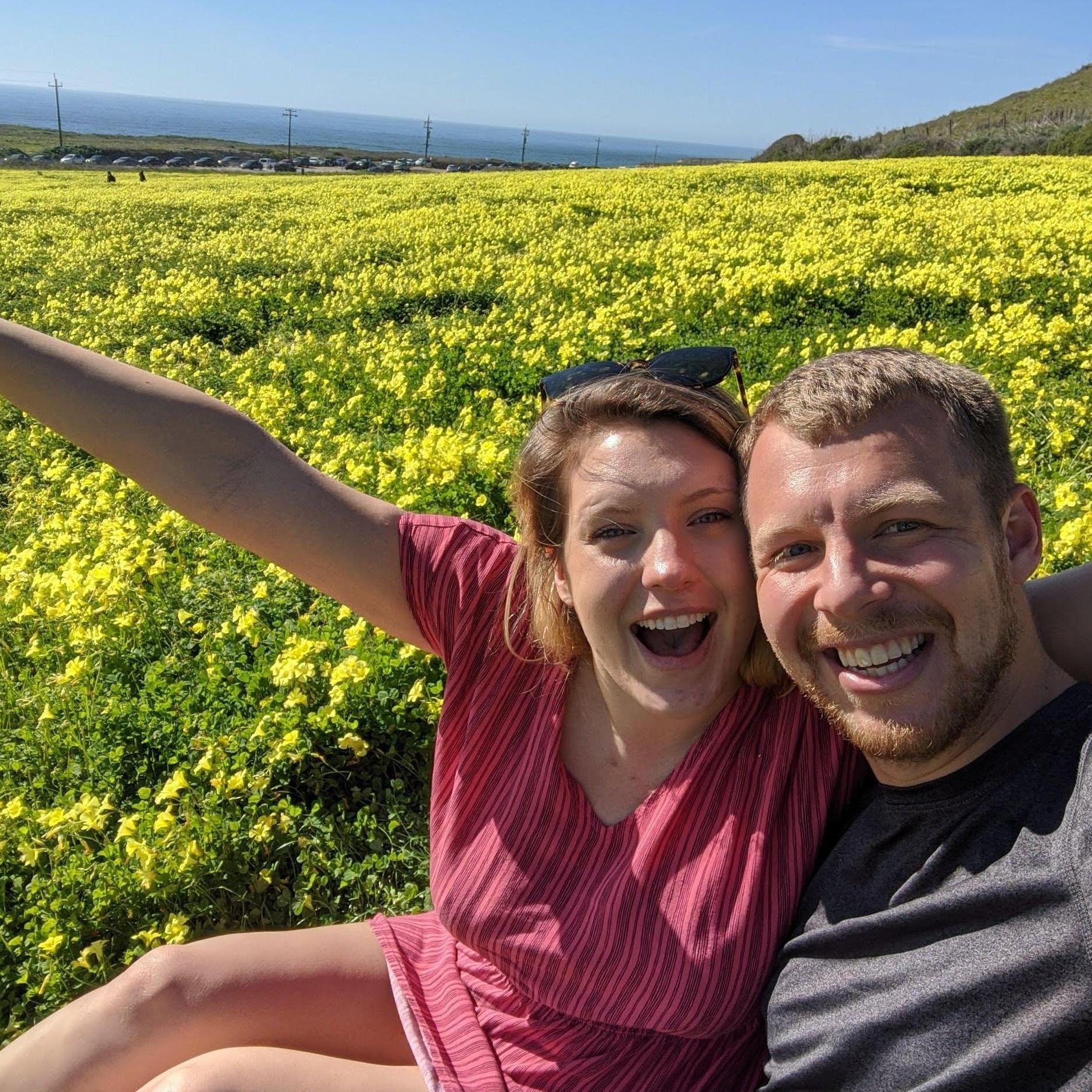 Only a few weeks into dating! Sitting in a flower field off the coast before our first beach day together. (February/March 2021)