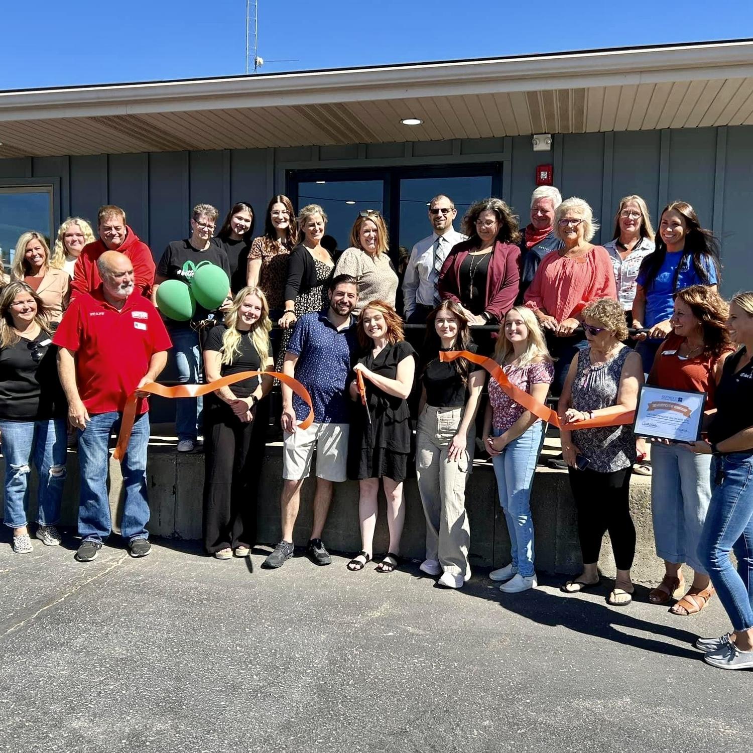 The day we cut the ribbon to our business!
