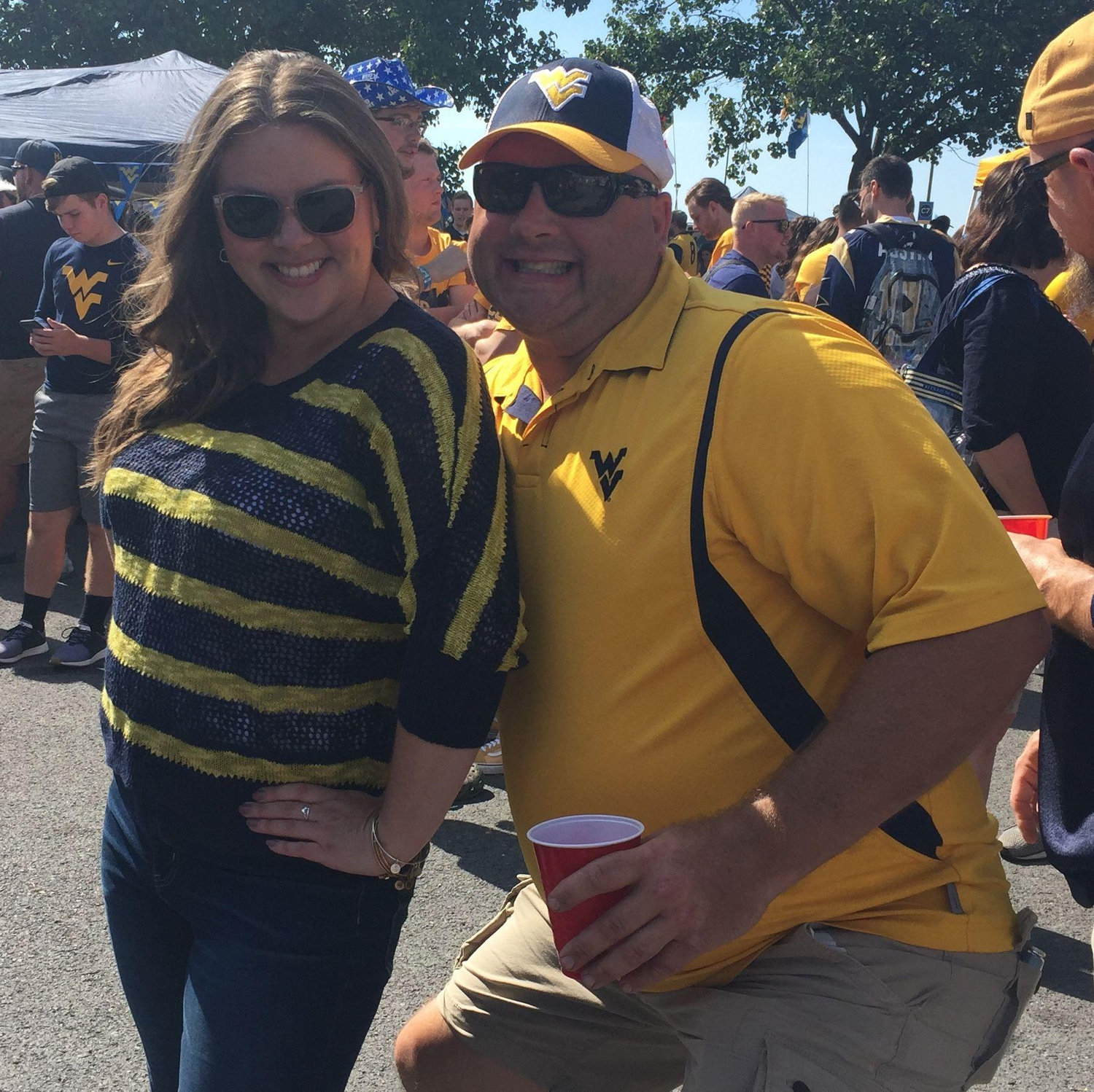 Our first picture together before we ever knew each other...randomly snapped at a WVU football tailgate. One might say we were destined to be together!