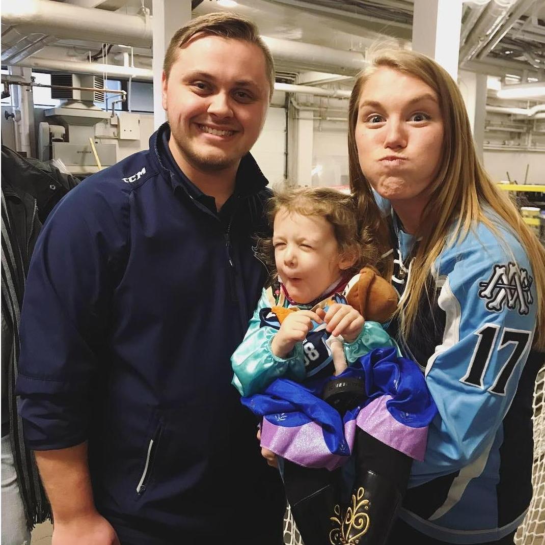 Our flower girl (Shan's niece) sporting a silly face during Princess Day at the Admirals Game!