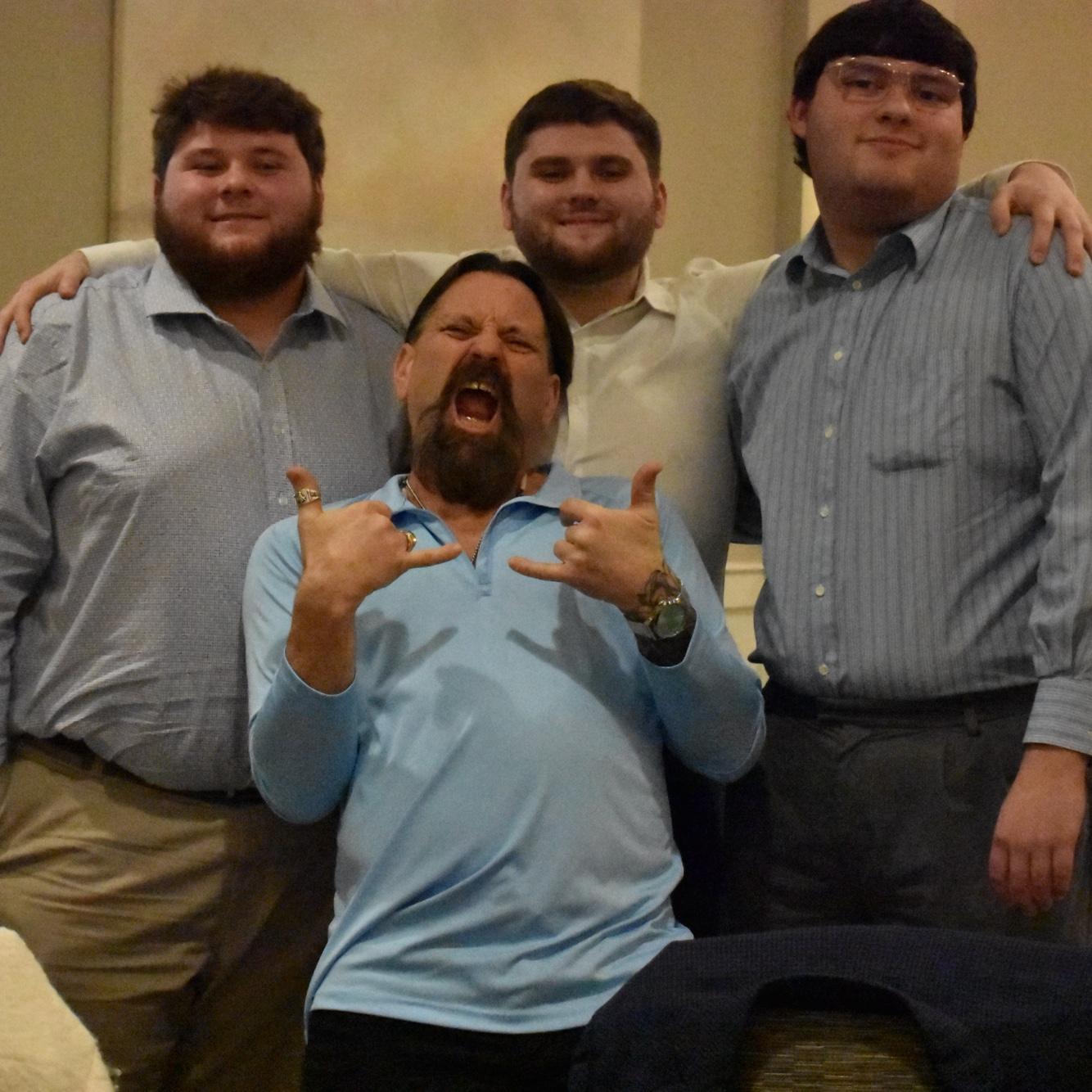 Logan with his brother Dylan, father Scott, & Mabel’s brother Homer