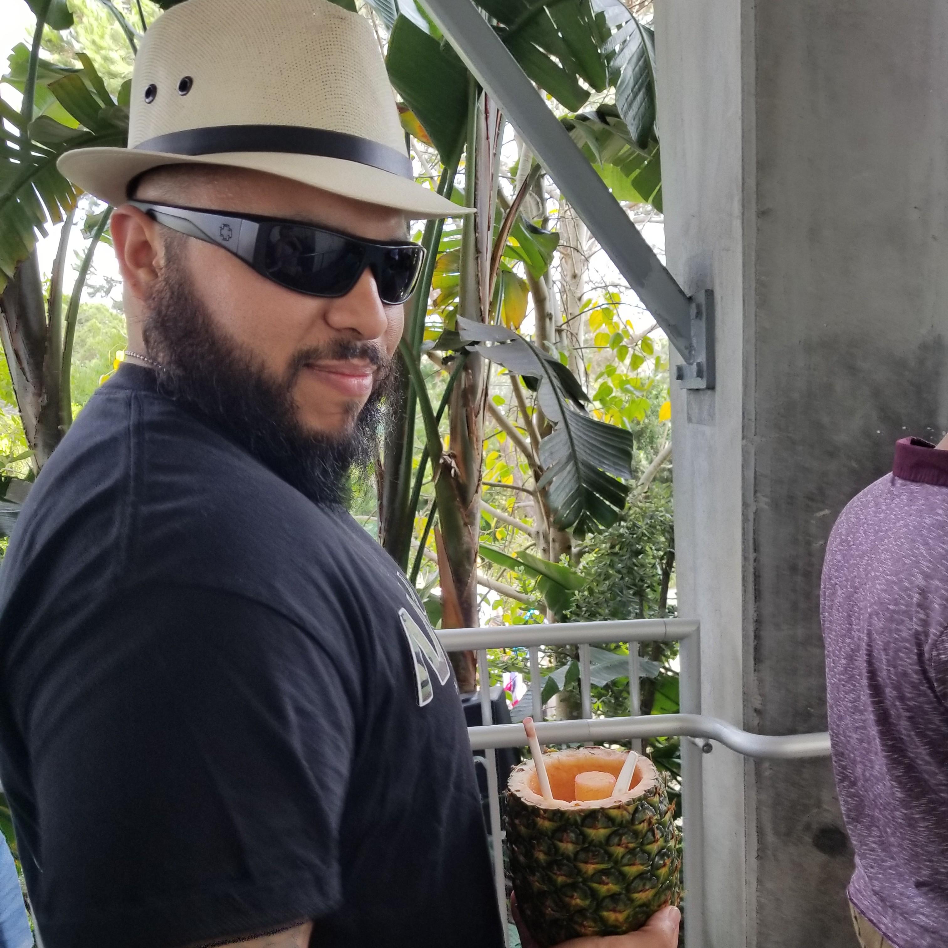 Good looking guy with his Pineapple Drink. cheers!