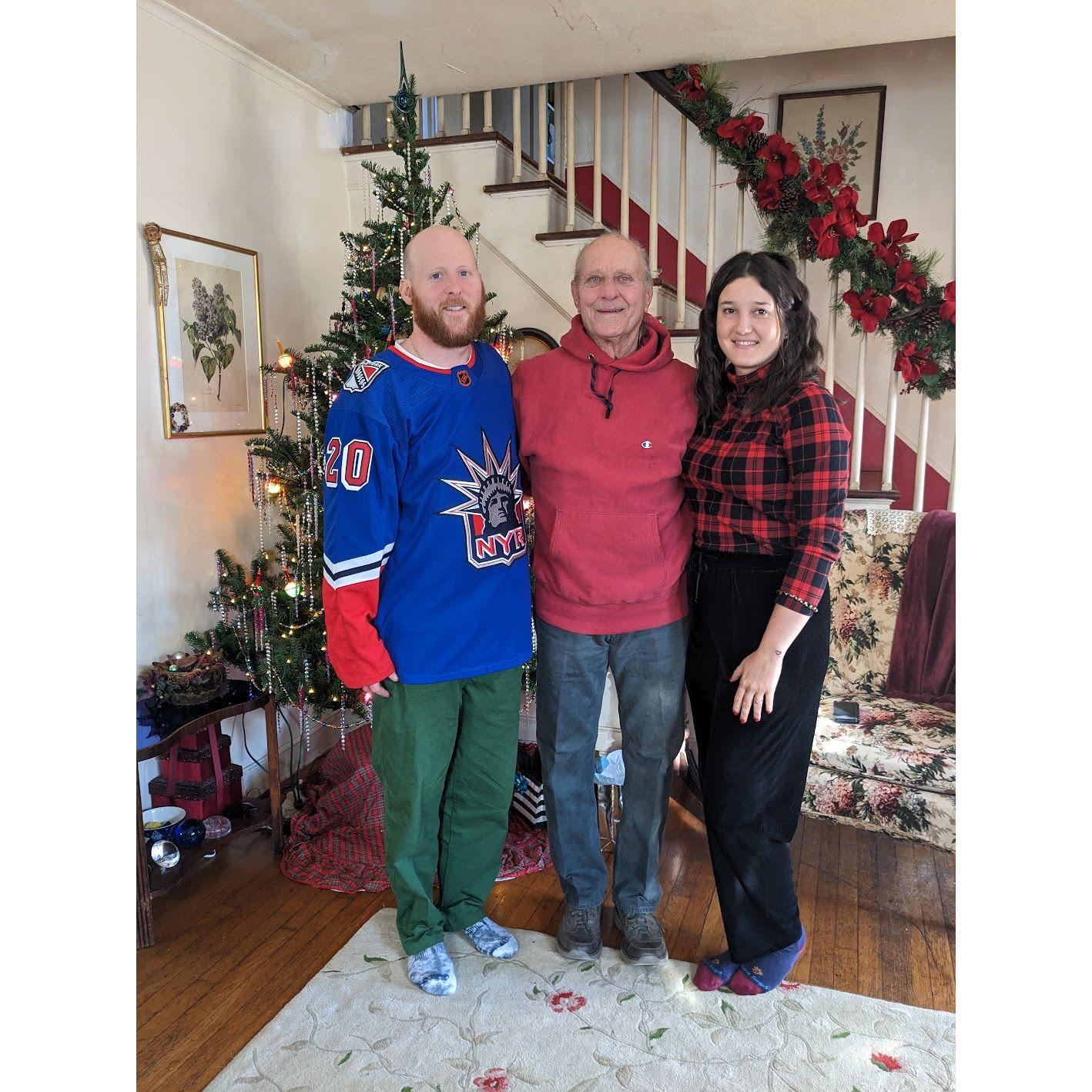 Annual Christmas photo with Alex's father, 2022