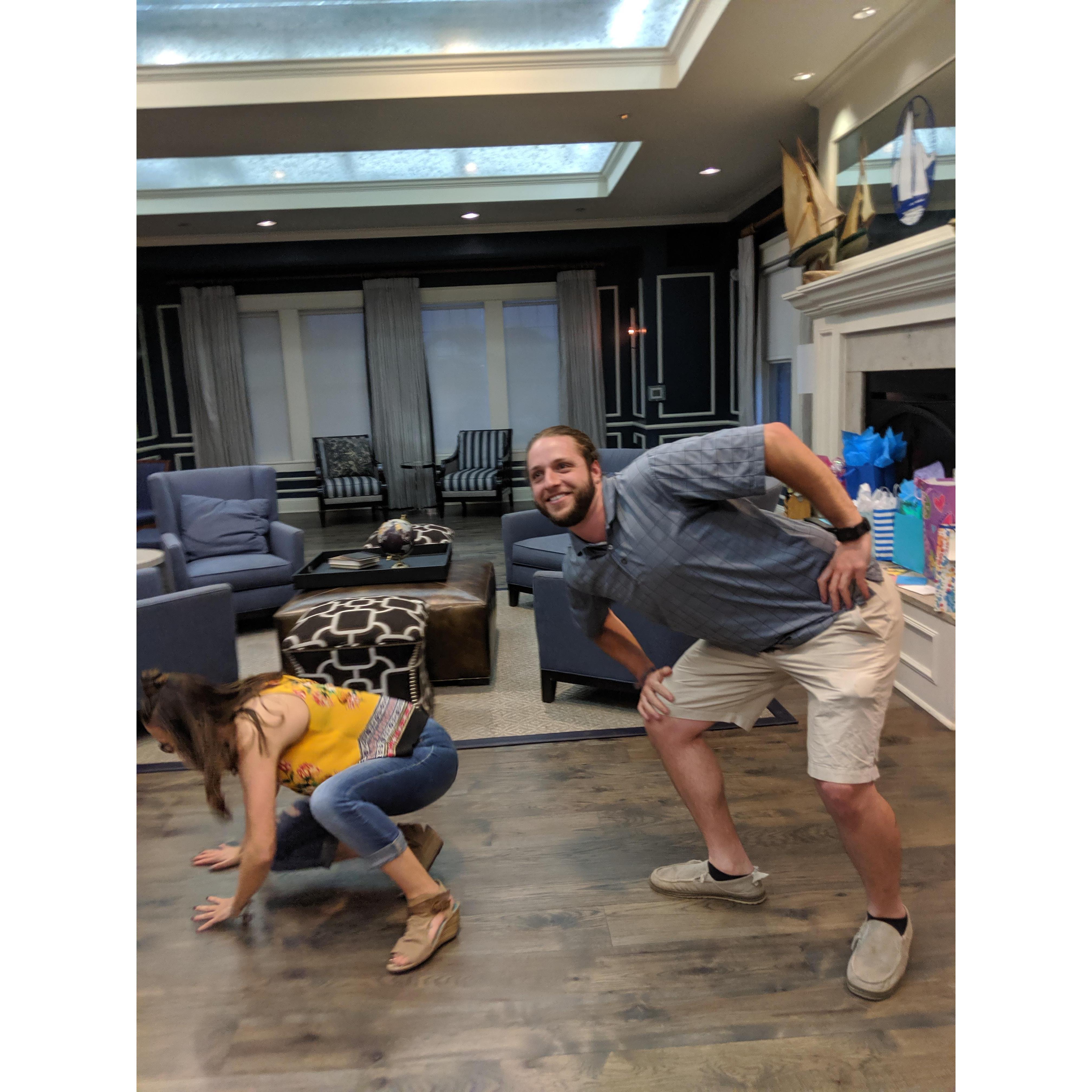 Right before this Wyatt poked Mallory in the back of the knee. This was on her 21st birthday... needless to say some beverages were had as well.