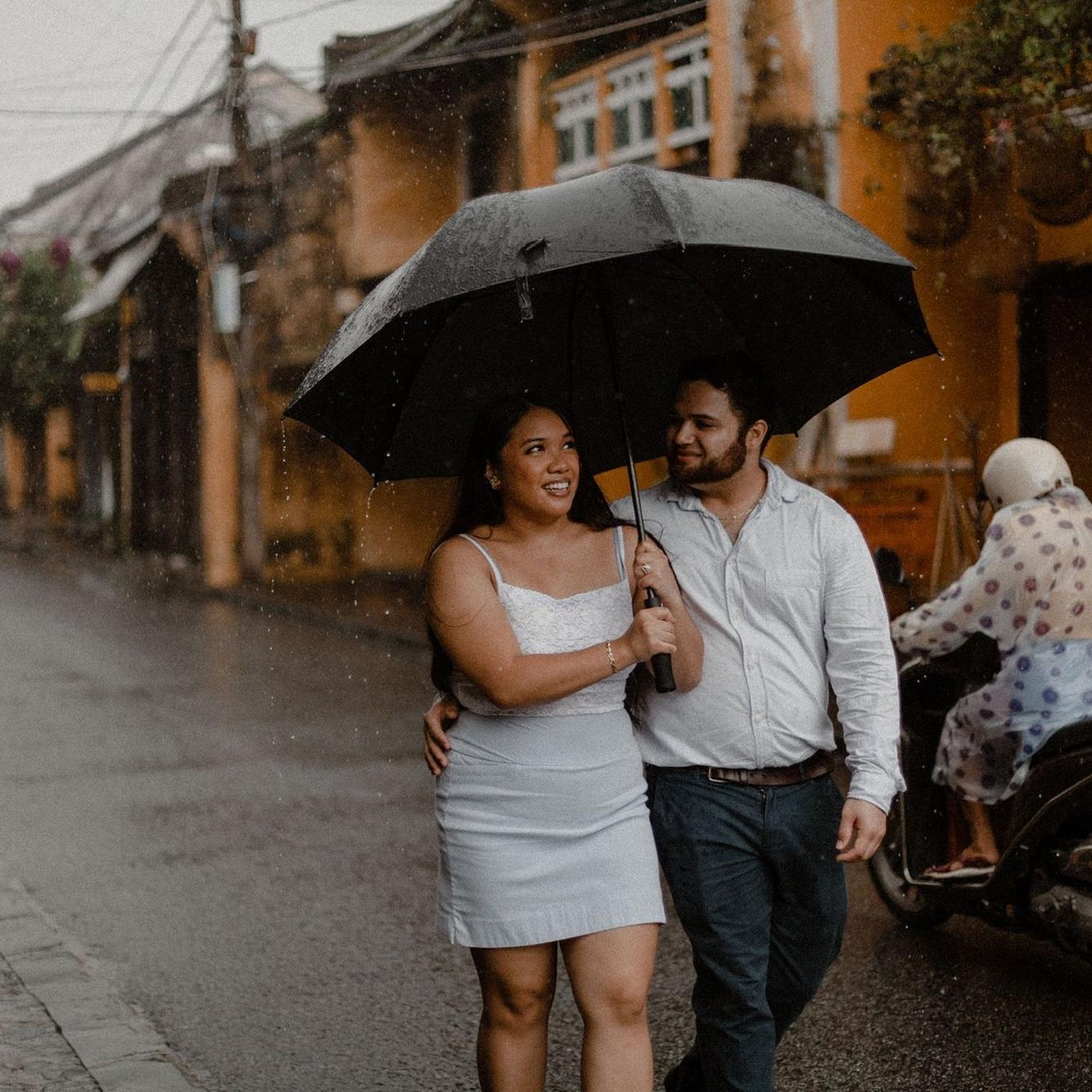 The next morning Andrew scheduled an engagement photo shoot with the photographer that captured our engagement in Old Town Hoi An. It was pouring! We used one of these photos for our Save the Dates ❤️