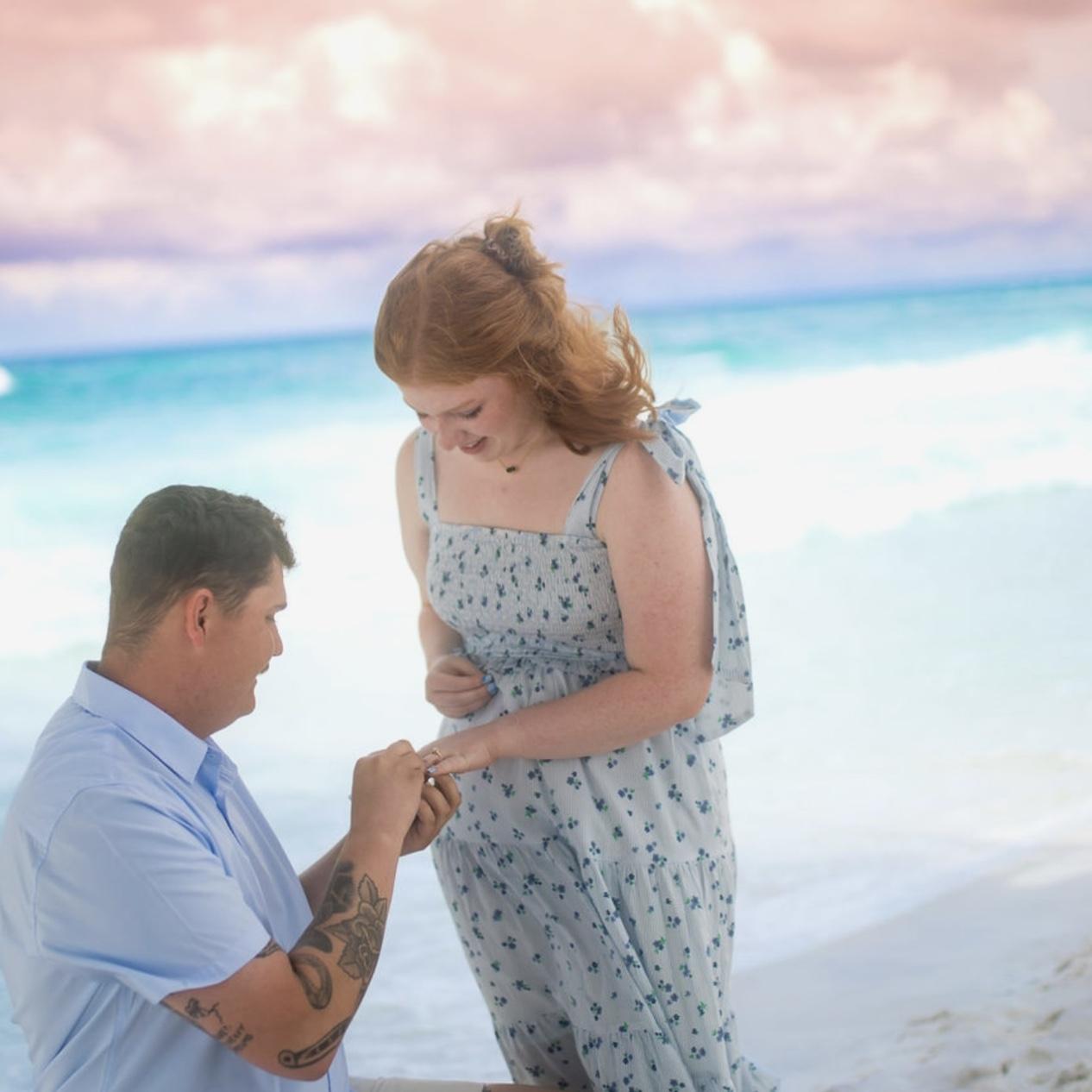 Jacob proposed during pictures with his family at the beach!