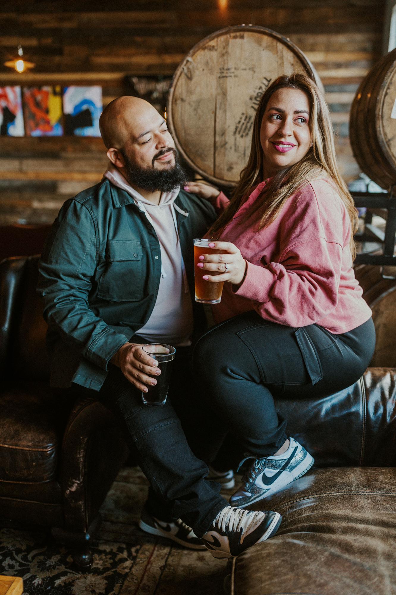 He looks at her the way they look at beer.