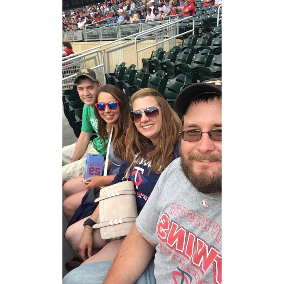 seth, jessica, torrie, and jordan taking in an annual twins game