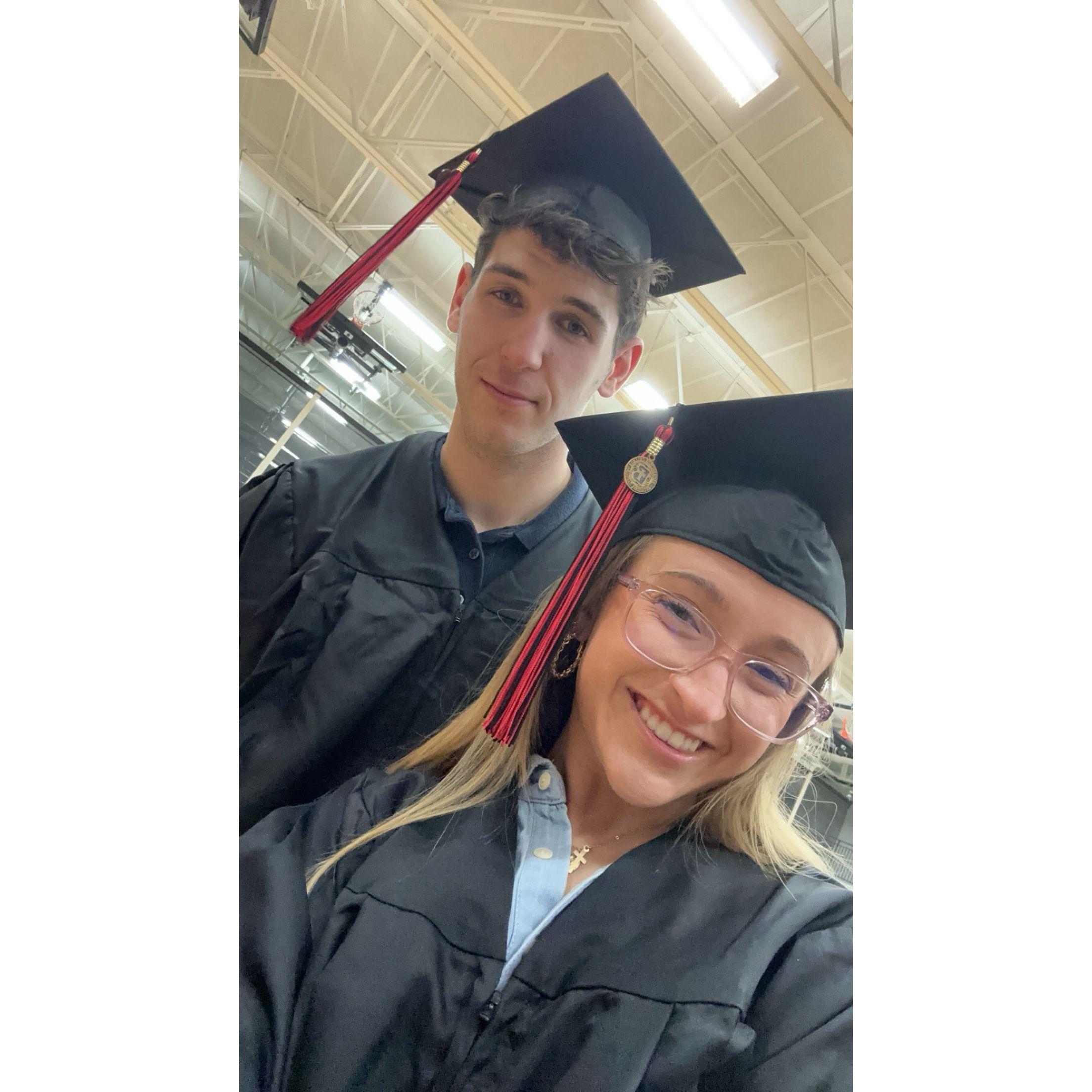 Trying on our graduation cap and gowns!