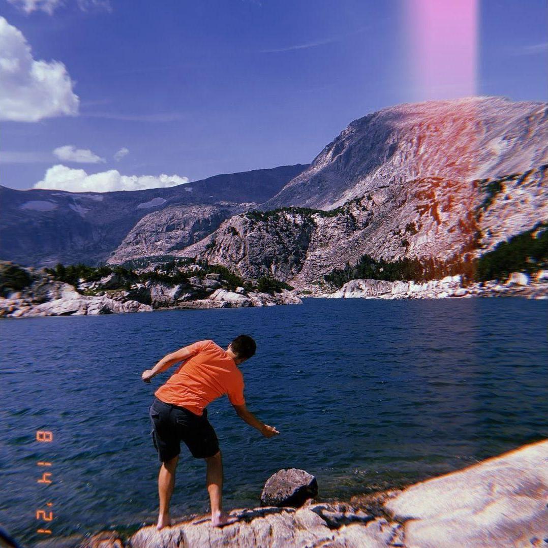 Eva took this picture of Andrew skipping rocks soon after we met. We were on a group hike and ended up alone somehow... but we hiked mostly in silence since we didn't think we had much in common.