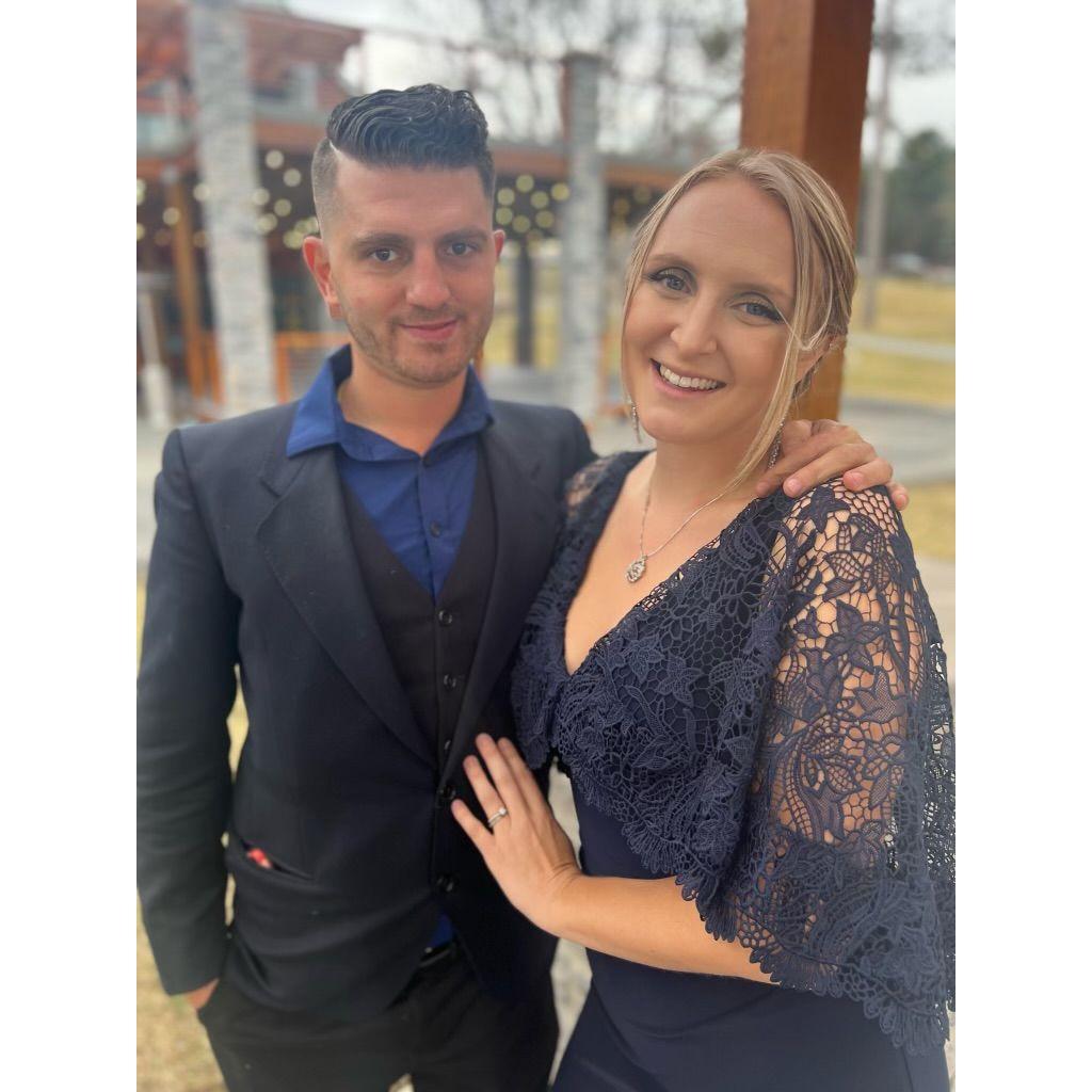 Bailey and Angelo attending Mikayla and Brad's wedding in March, 2023.