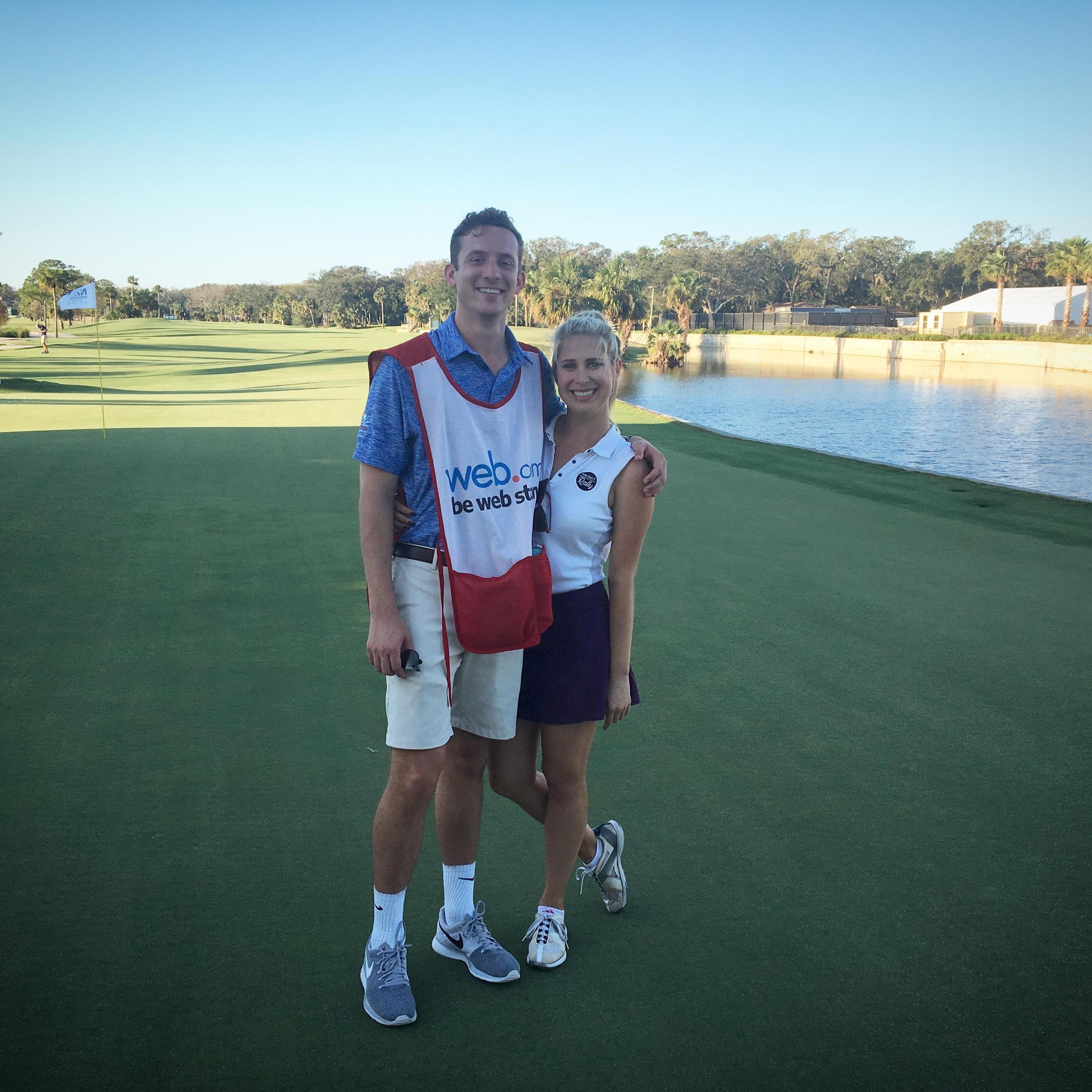 Harry acting as Kelly's caddie at an event before the Web.com Tour Championship ... don't ask what she shot ...