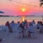 Have a drink & watch the sunset at Lorelei Restaurant & Cabana Bar