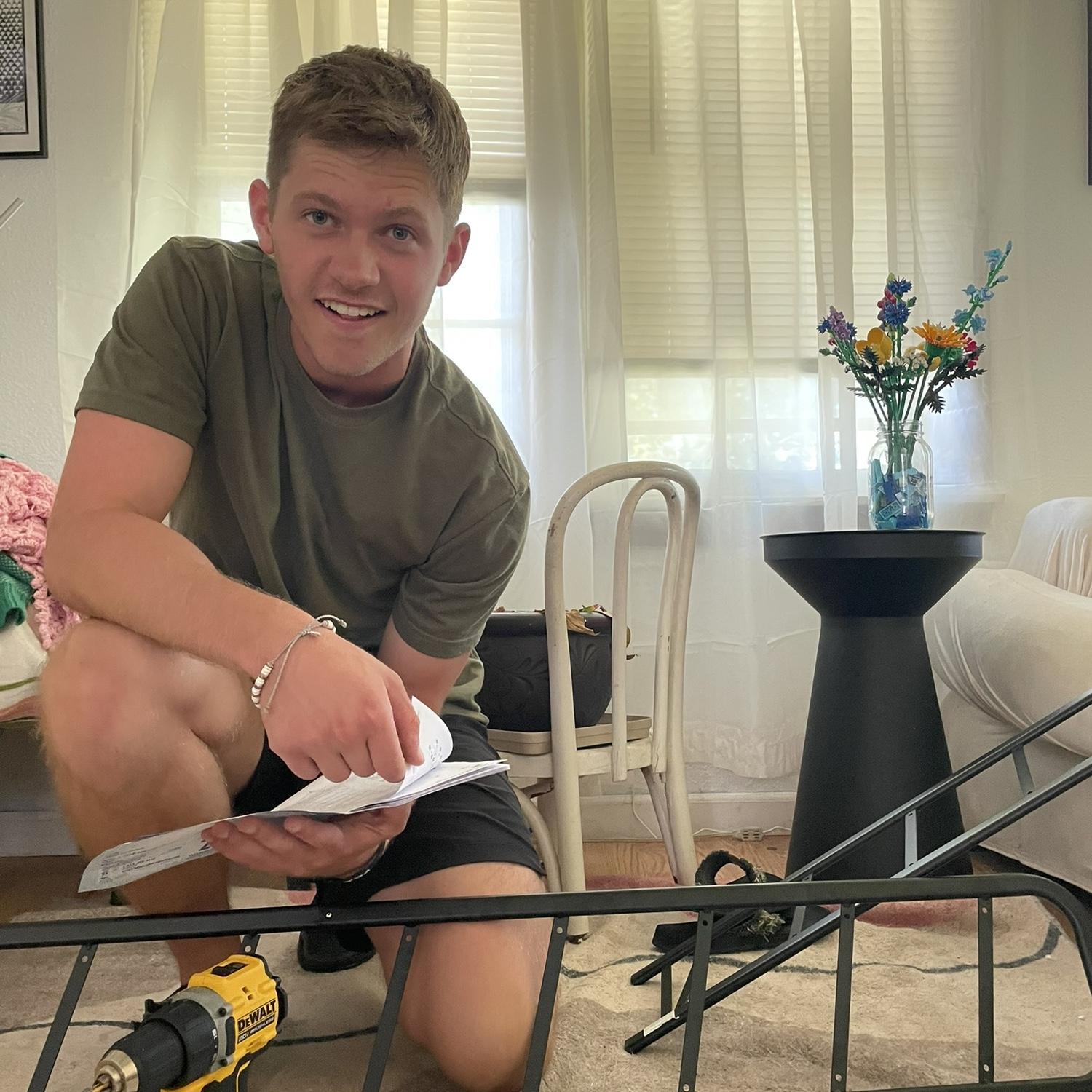 Move-in day. Axton was very helpful. 
May knew he was her bestfriend.