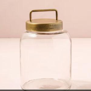 https://magnolia.com/shop/product/6585492832307/antique-brass-and-glass-canister/?variant=39472241672243