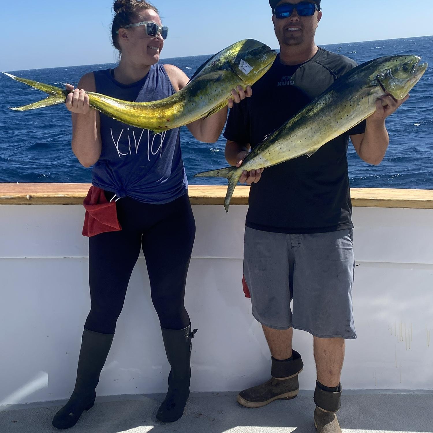 Amanda and Jeff love to go deep sea fishing. Amanda caught a bigger fish and wanted Jeff to give it a little kissy.