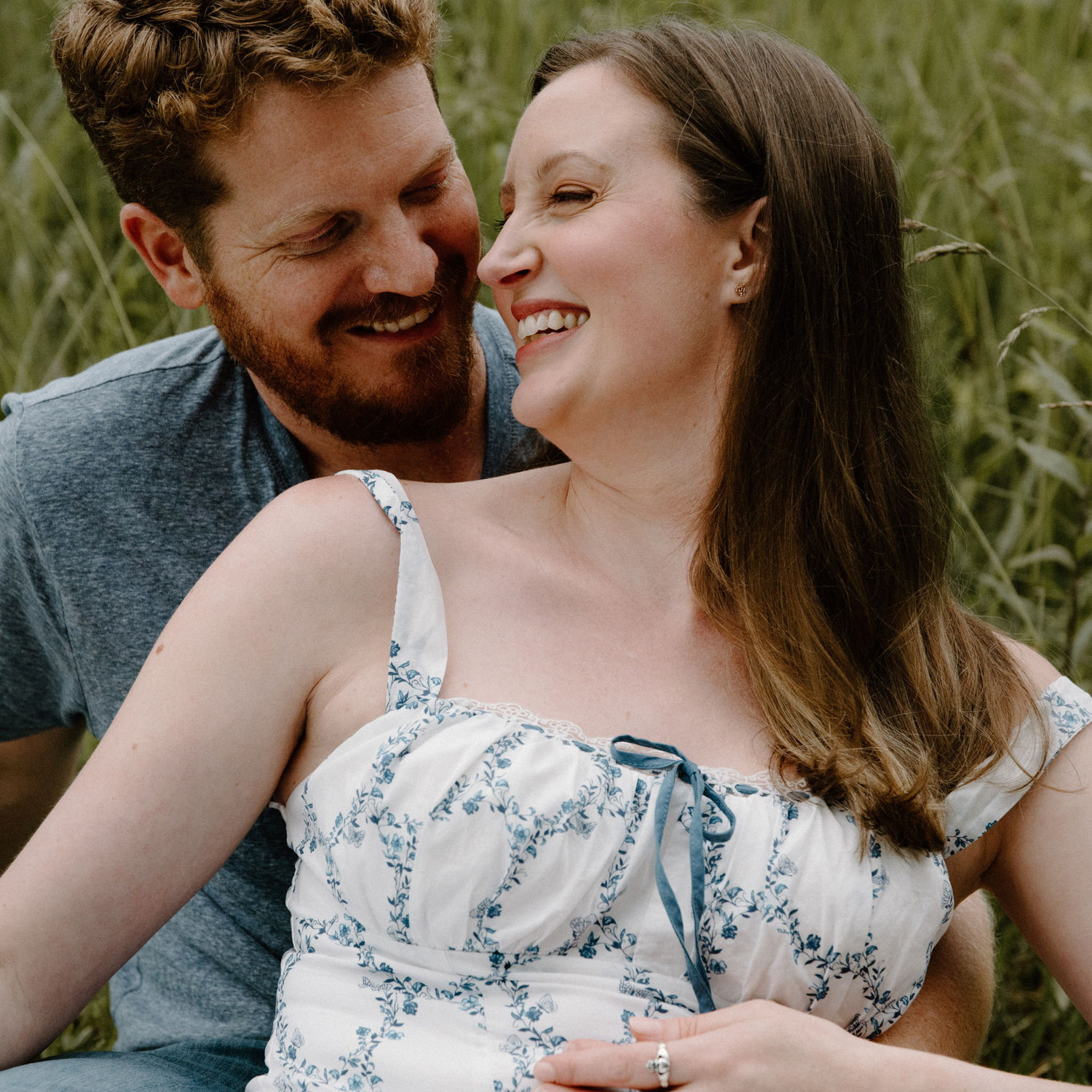 Despite hand placement, not a pregnancy announcement.