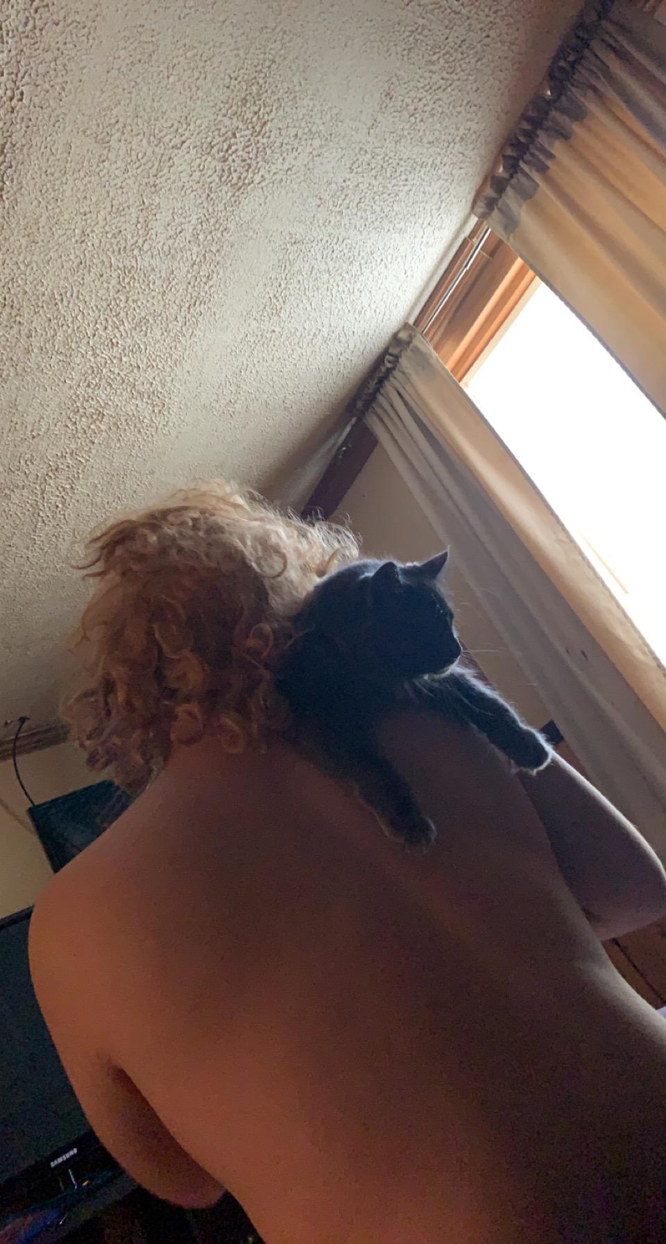 This photo of him with my cat, Bandit. Oddly, my animals are just as OBSESSED with him as I am ❤️