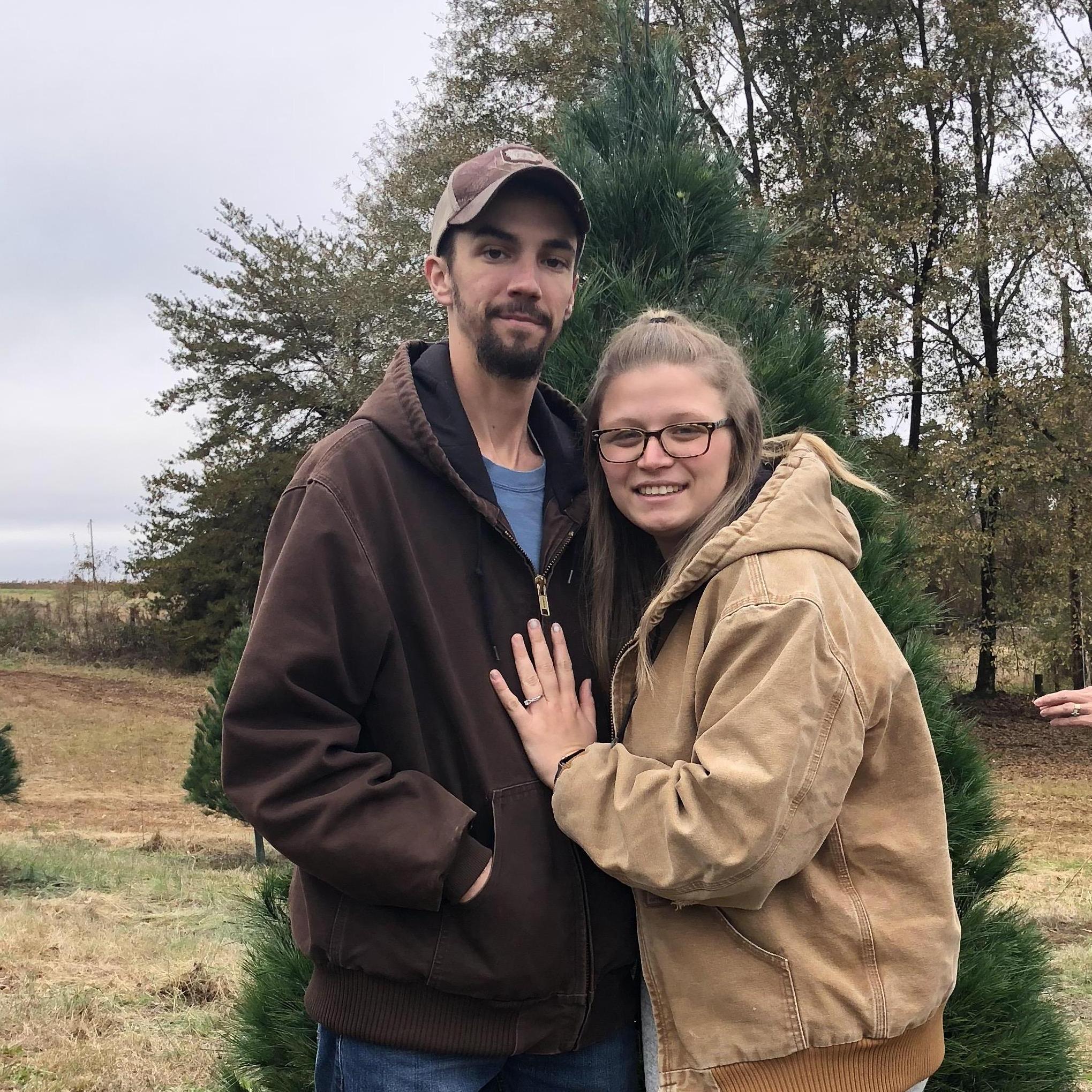 Finding our families first live Christmas tree.