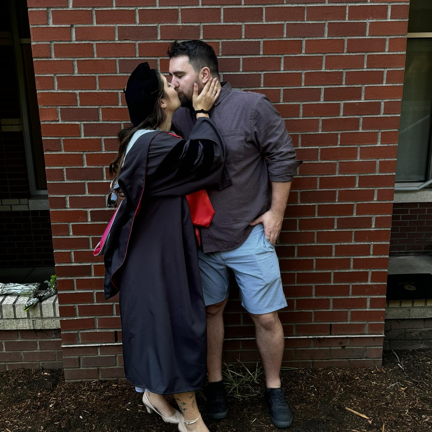 Kelsey graduated from her OTD program and Scott kissed a doctah