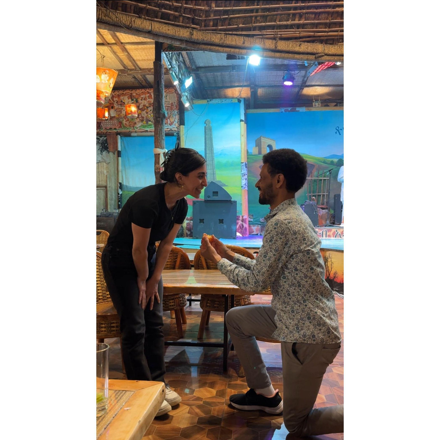 7 Feb 2025:  Fena surprises Pani by "proposing" in front of Ethiopian Bahá'í friends at a restaurant in Addis