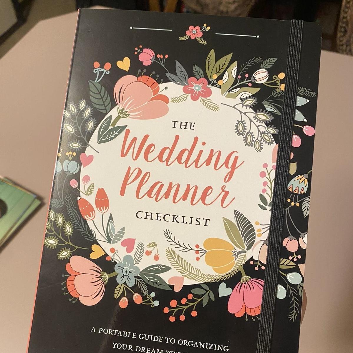 Molly's supervisor gifted us a wedding planner. So sweet!