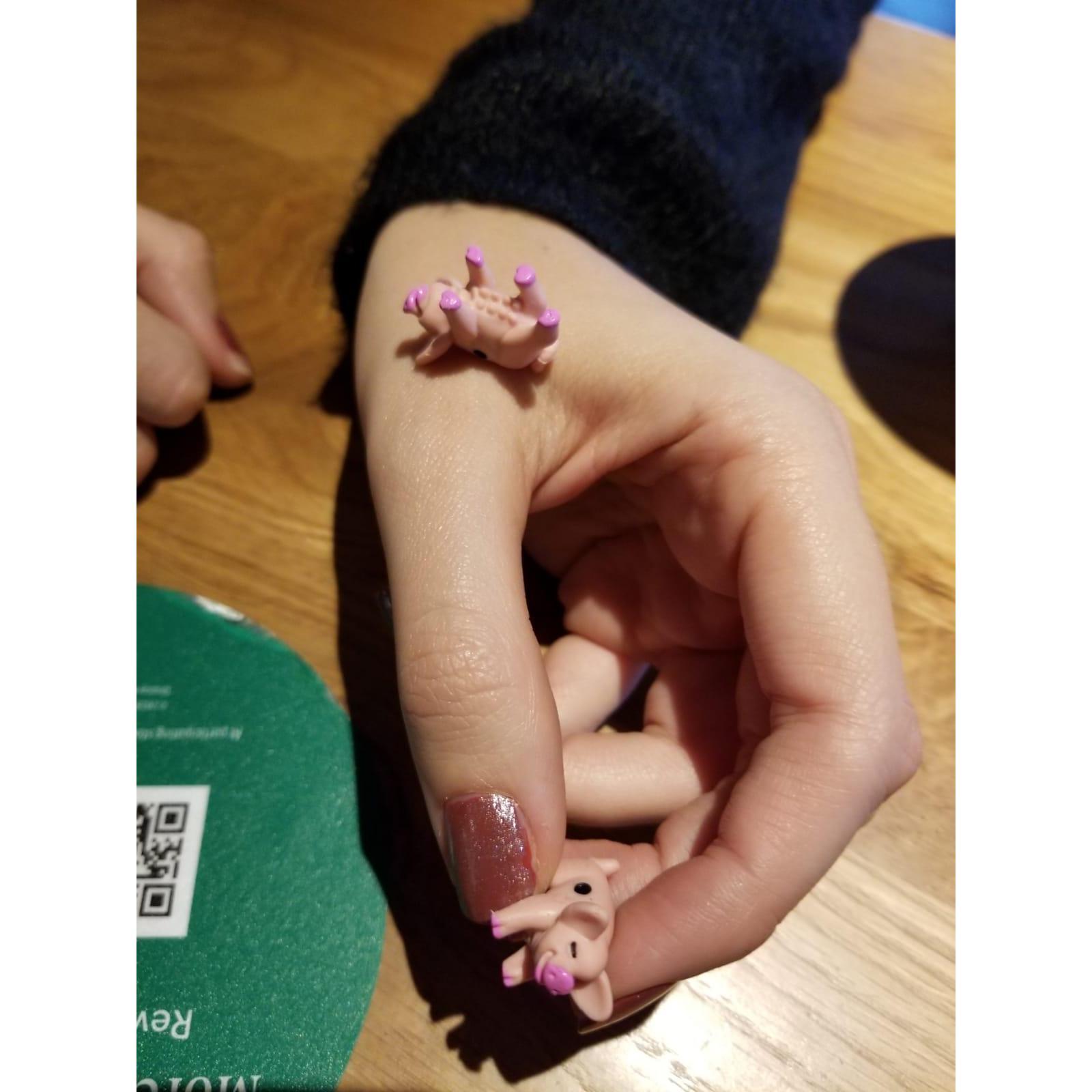 A friendly game of Pass the Pigs at Starbucks before we were "officially" dating