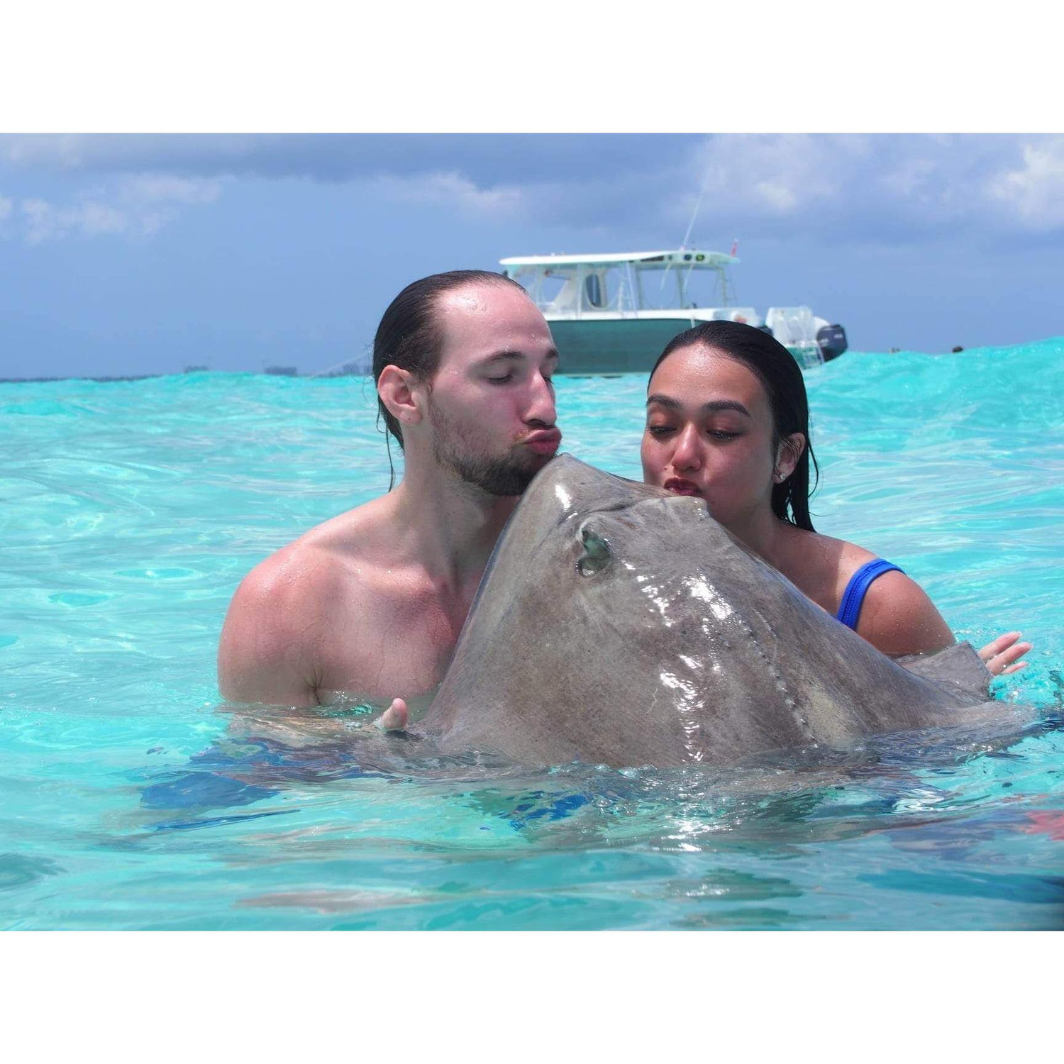 April 6, 2023- Swimming with stingrays.