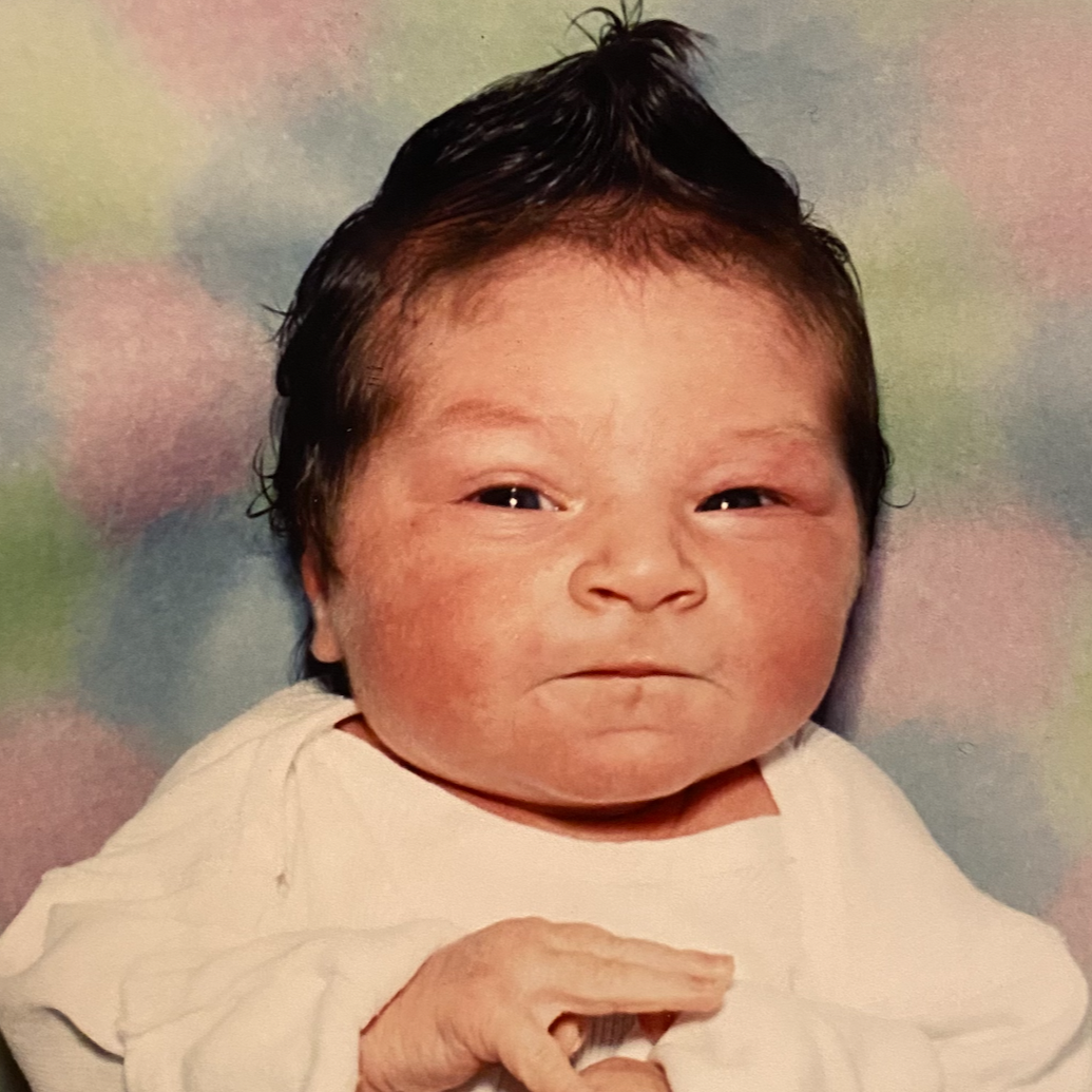 Julia as a newborn. She is fully aware that she will never again look this good.