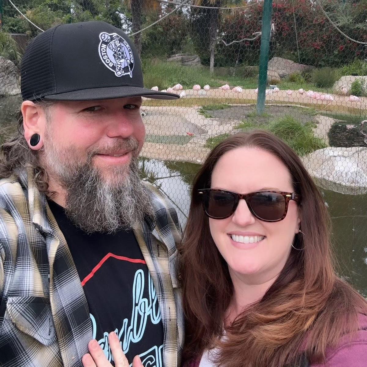 Todd had to get a photo with his flamingo friends at Oakland Zoo, May 2024