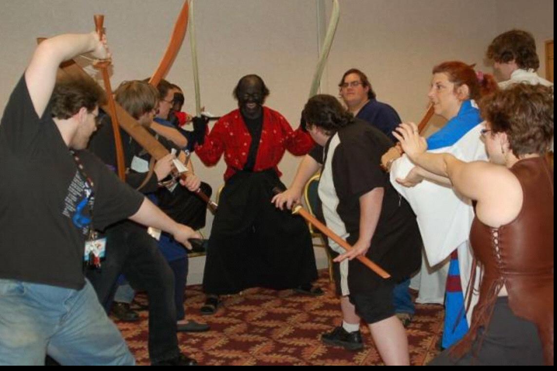 Gene at a five rings larp during one of the Dreamation/Dexcon events (back right)