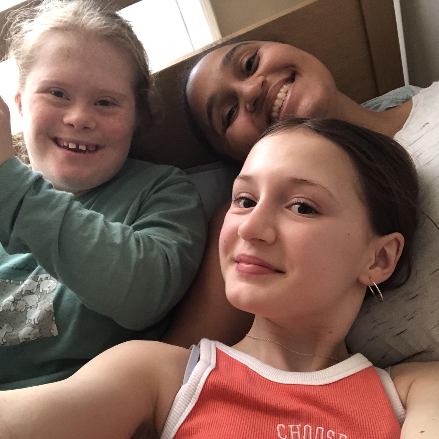 Cuddles in Norwich, UK with Thomas's cousins Sarah and Elizabeth