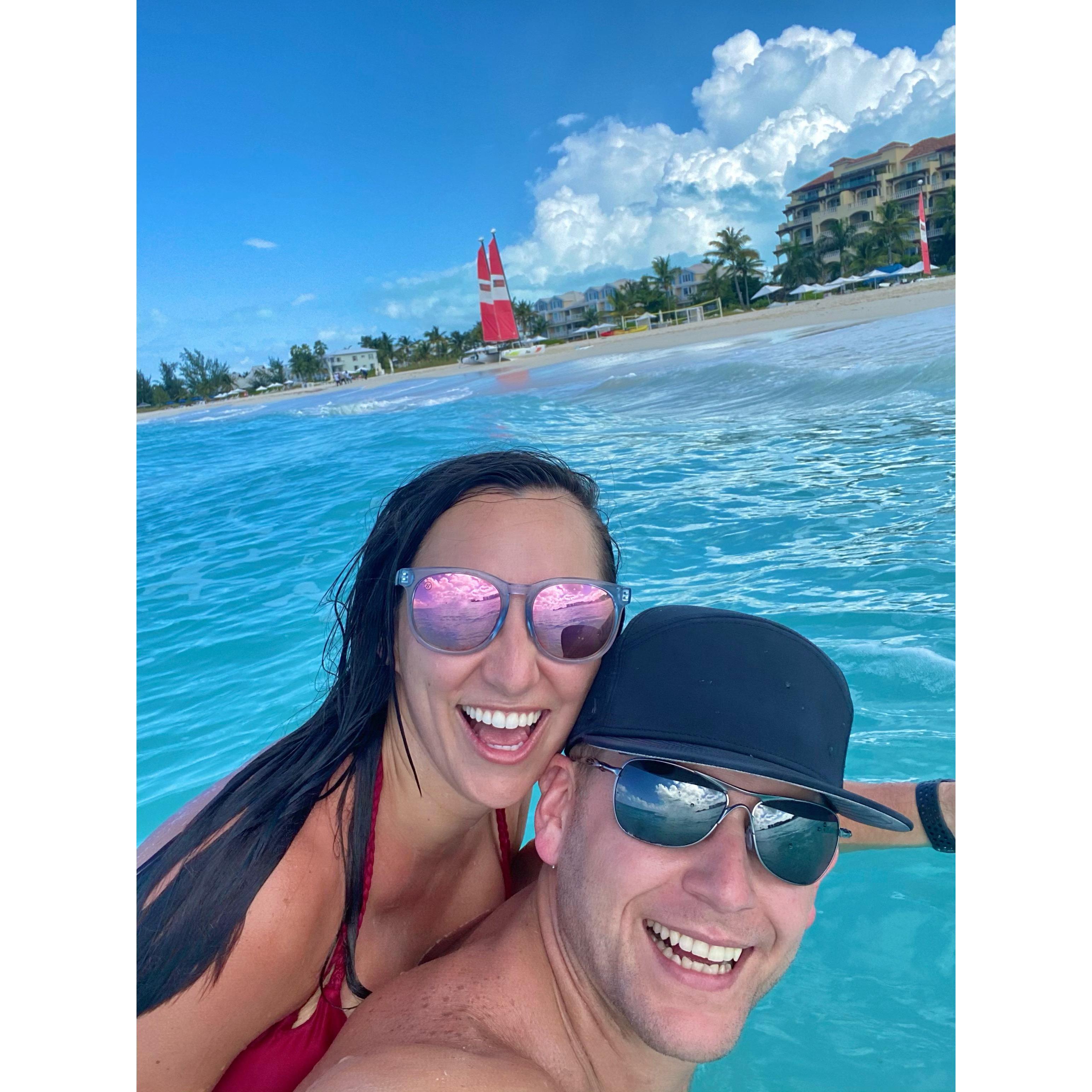 Taking a break from the sun in the crystal clear water in Turks.