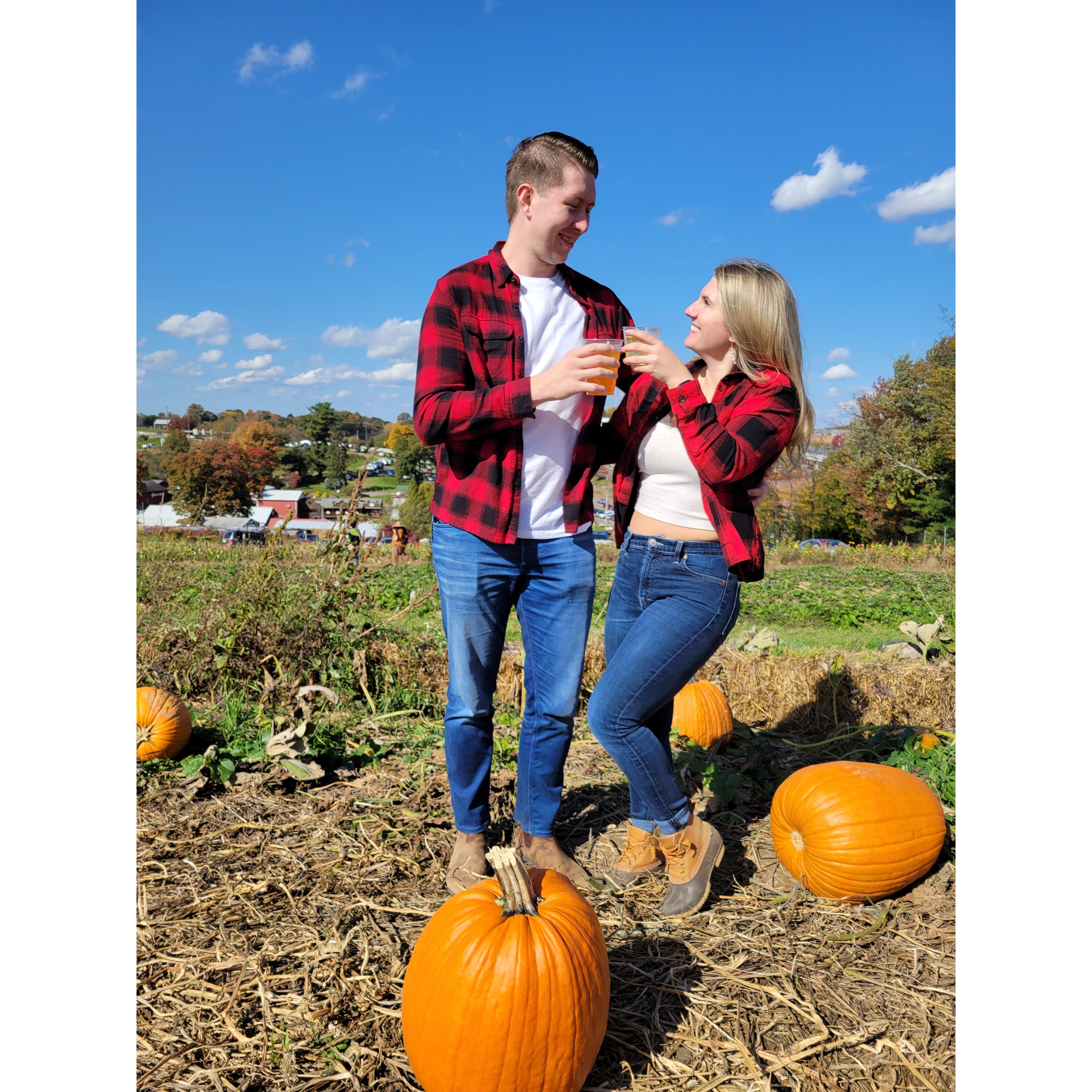 Shelby's favorite fall activity. Pumpkin patch while drinking Arsenal cider.