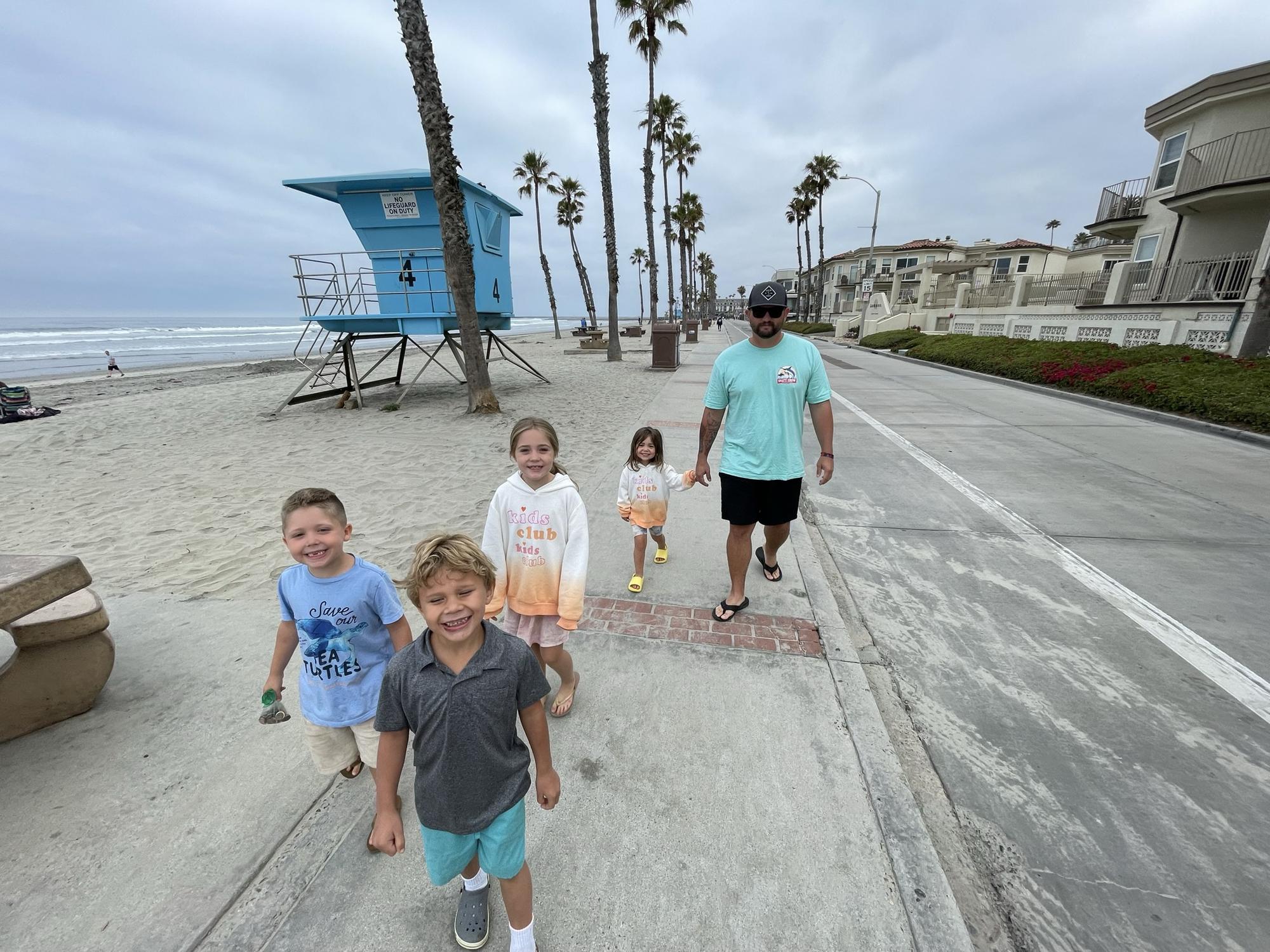 (Left to right) Easton, Tucker, Lucy, Lyla and Uncle Colt. Morning walks to the pier in Oceanside during the Rush family reunion!