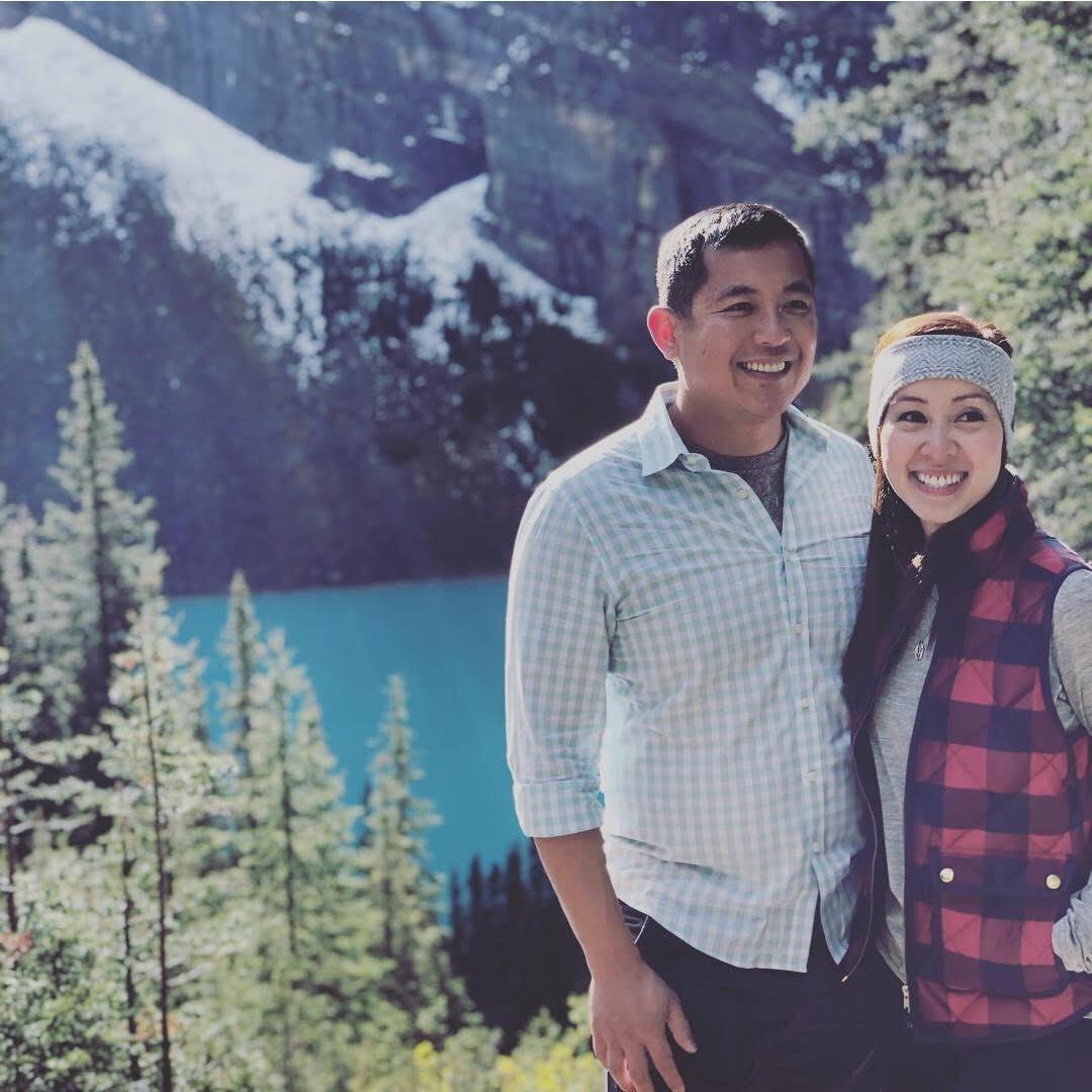 Our hike up to Lake Agnes in Banff. Our smiles don't tell you how tired we really were.