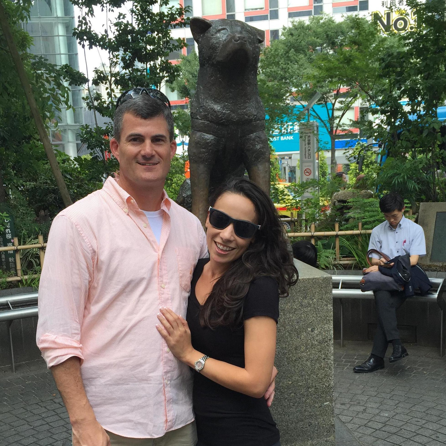 In front of the statue of the dog Hachiko in Shibuya, Japan - a dog hero for his remarkable loyalty - he waited each day at the train station for after his master died and never came home for 9 years.