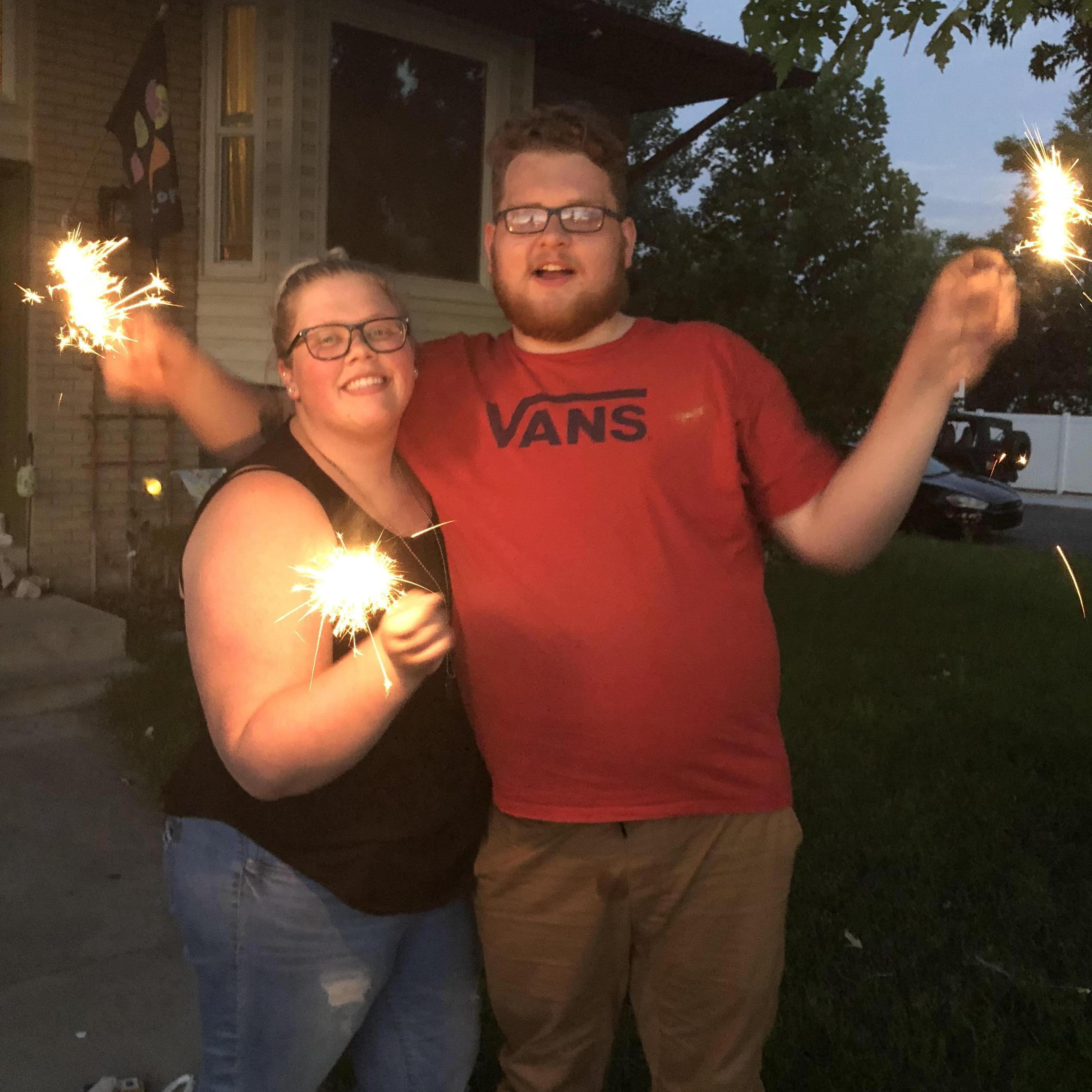 Celebrating the 4th of July with sparklers.