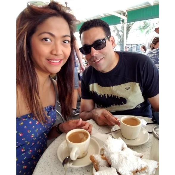Having Beignet at Cafe de Monde at the French Market in New Orleans